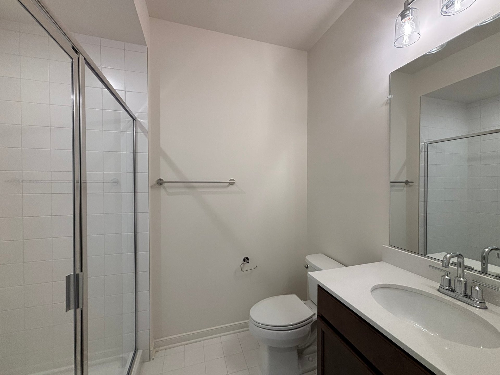secondary bathroom with an oversized shower