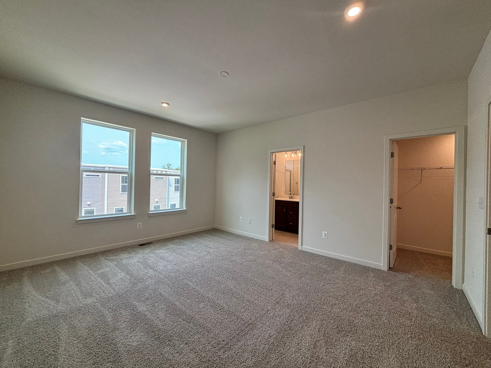 primary bedroom with natural light