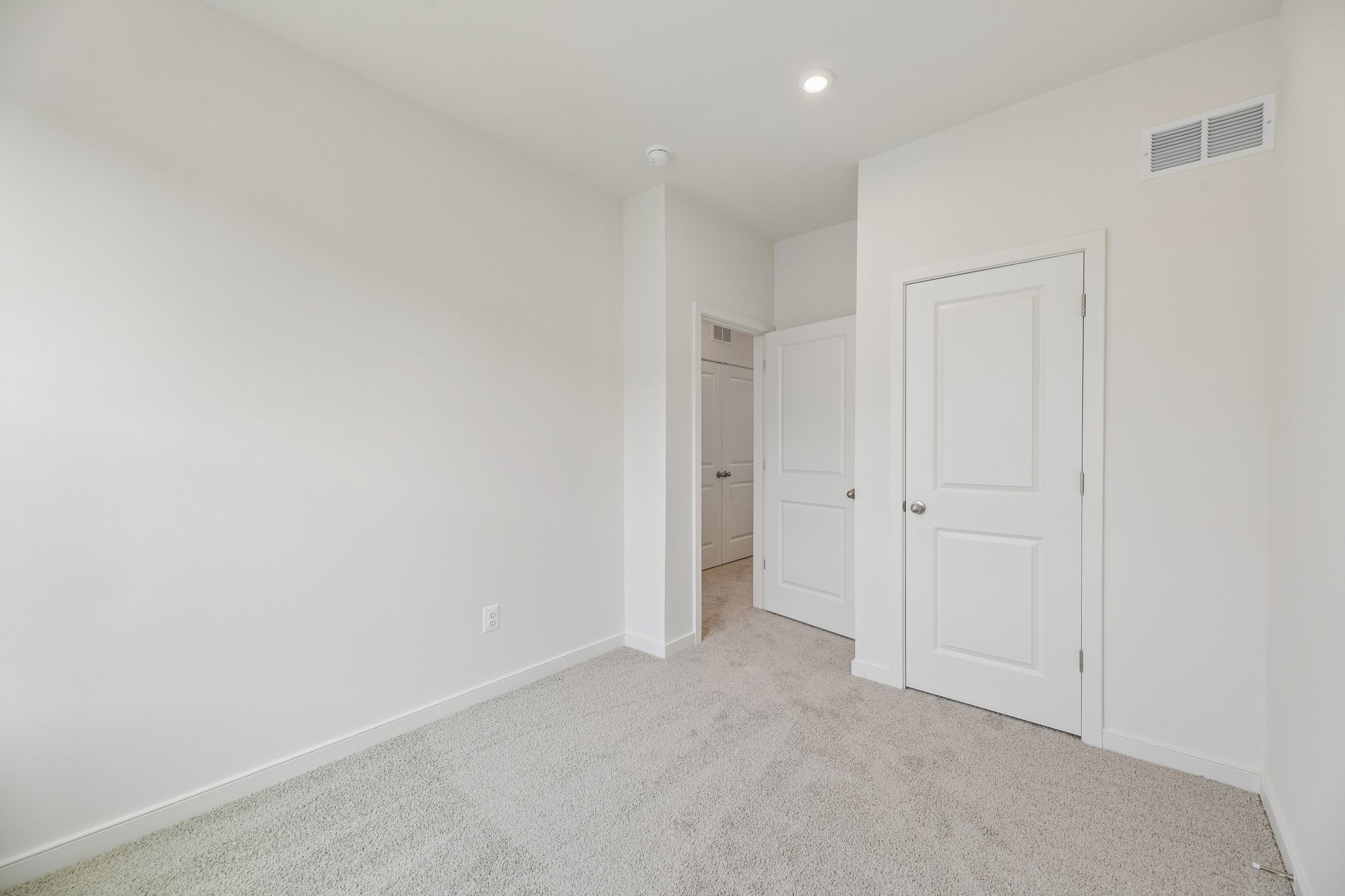 secondary bedroom with carpet