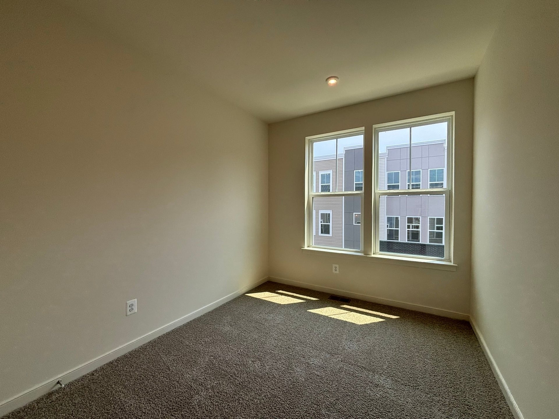 secondary bedroom with carpet
