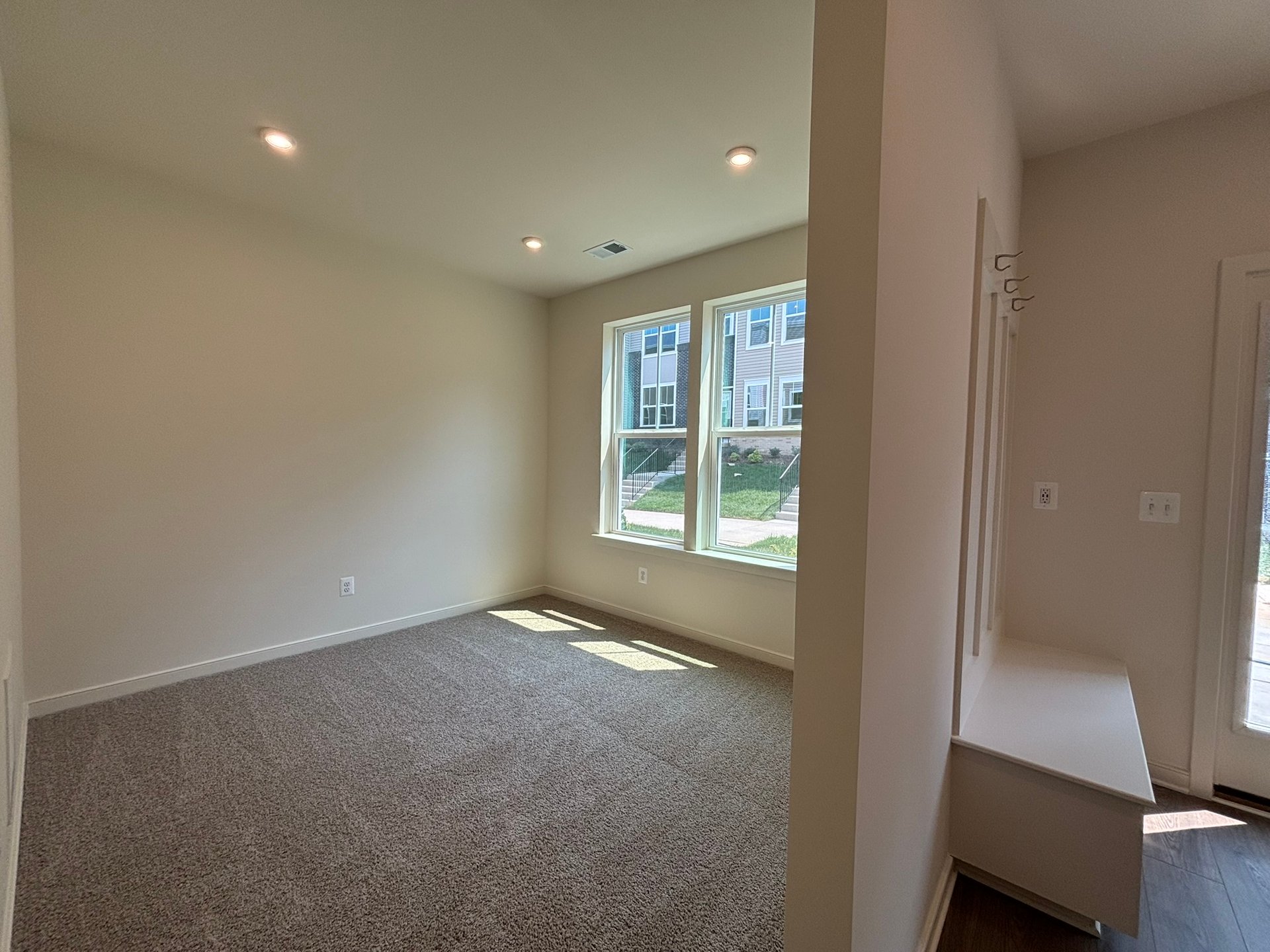 recreation room with two windows