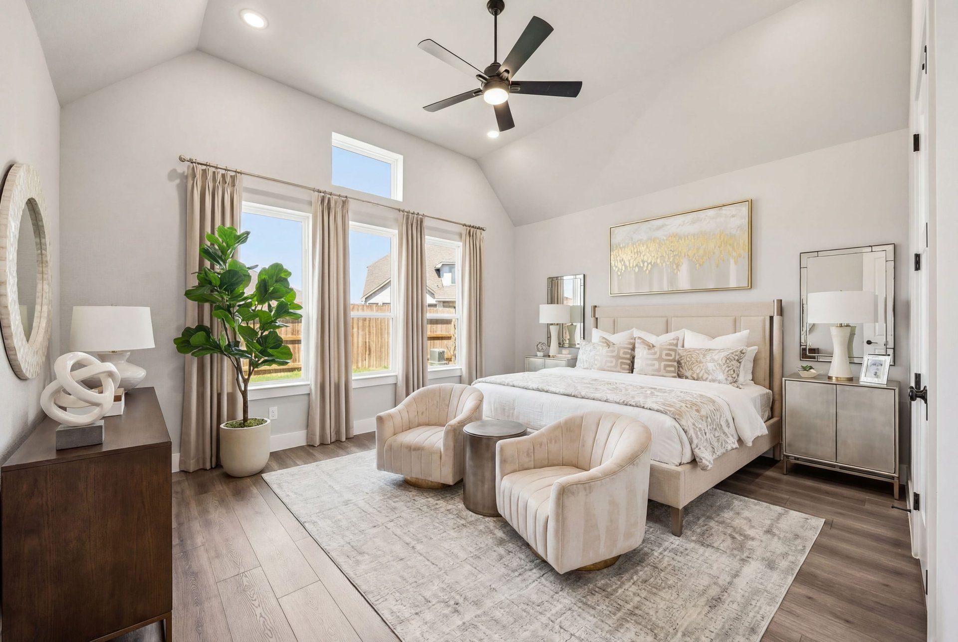 primary bedroom with vaulted ceilings
