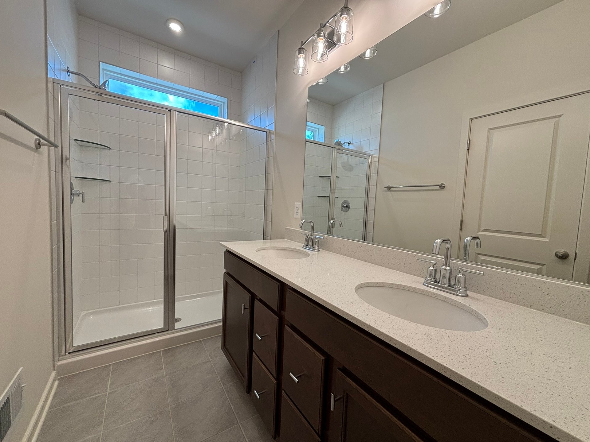 primary bathroom with an oversized shower