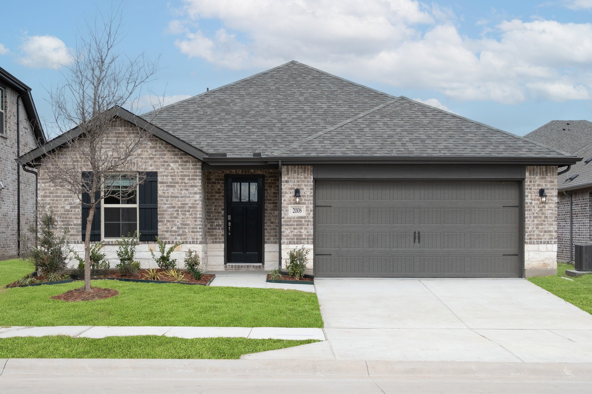 one-story with brick and stone exterior