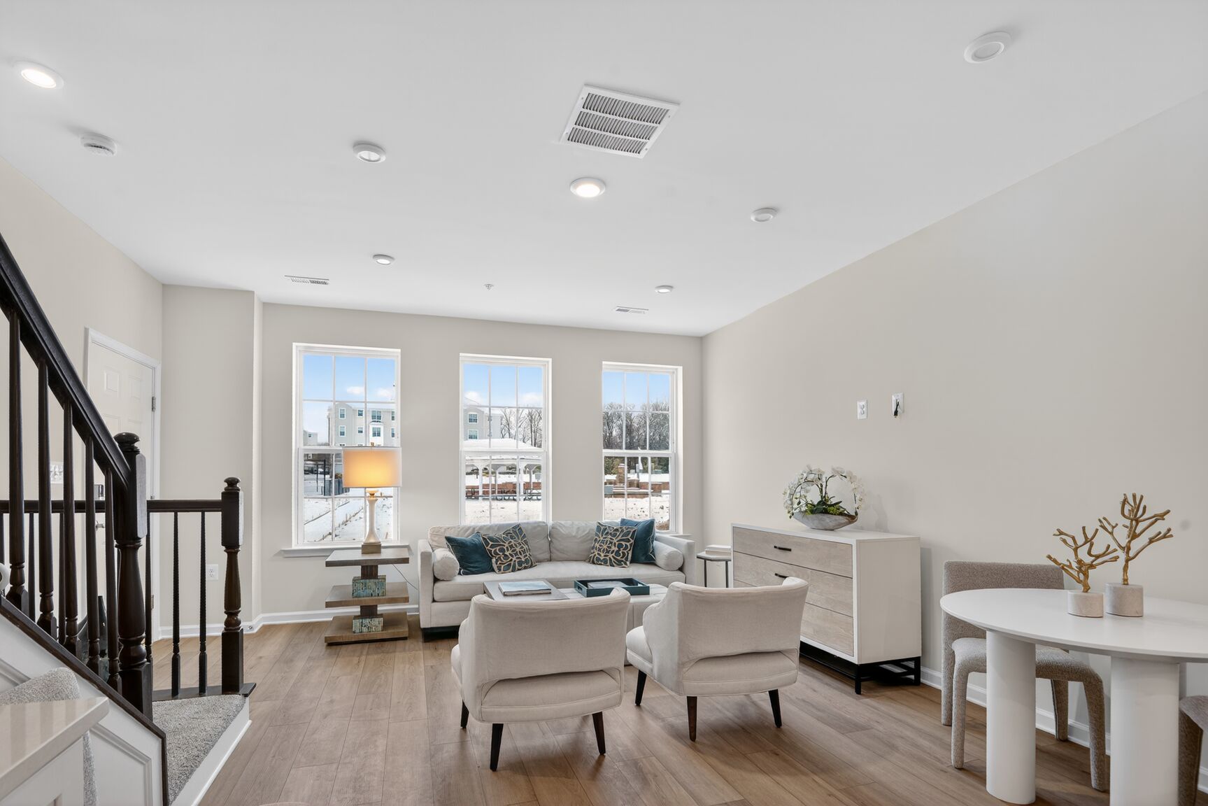 great room with multiple large windows