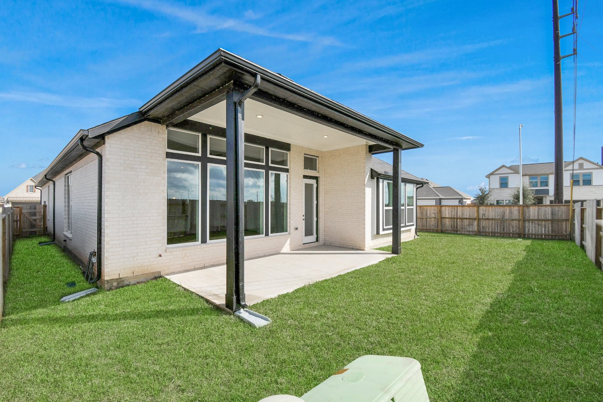 Covered Patio with greenery. 