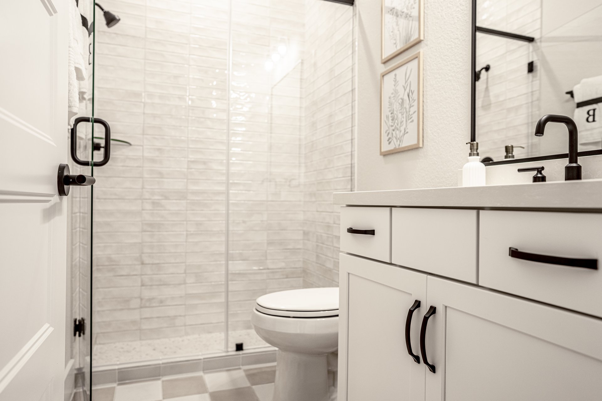 bath with walk-in shower and white cabinet vanity