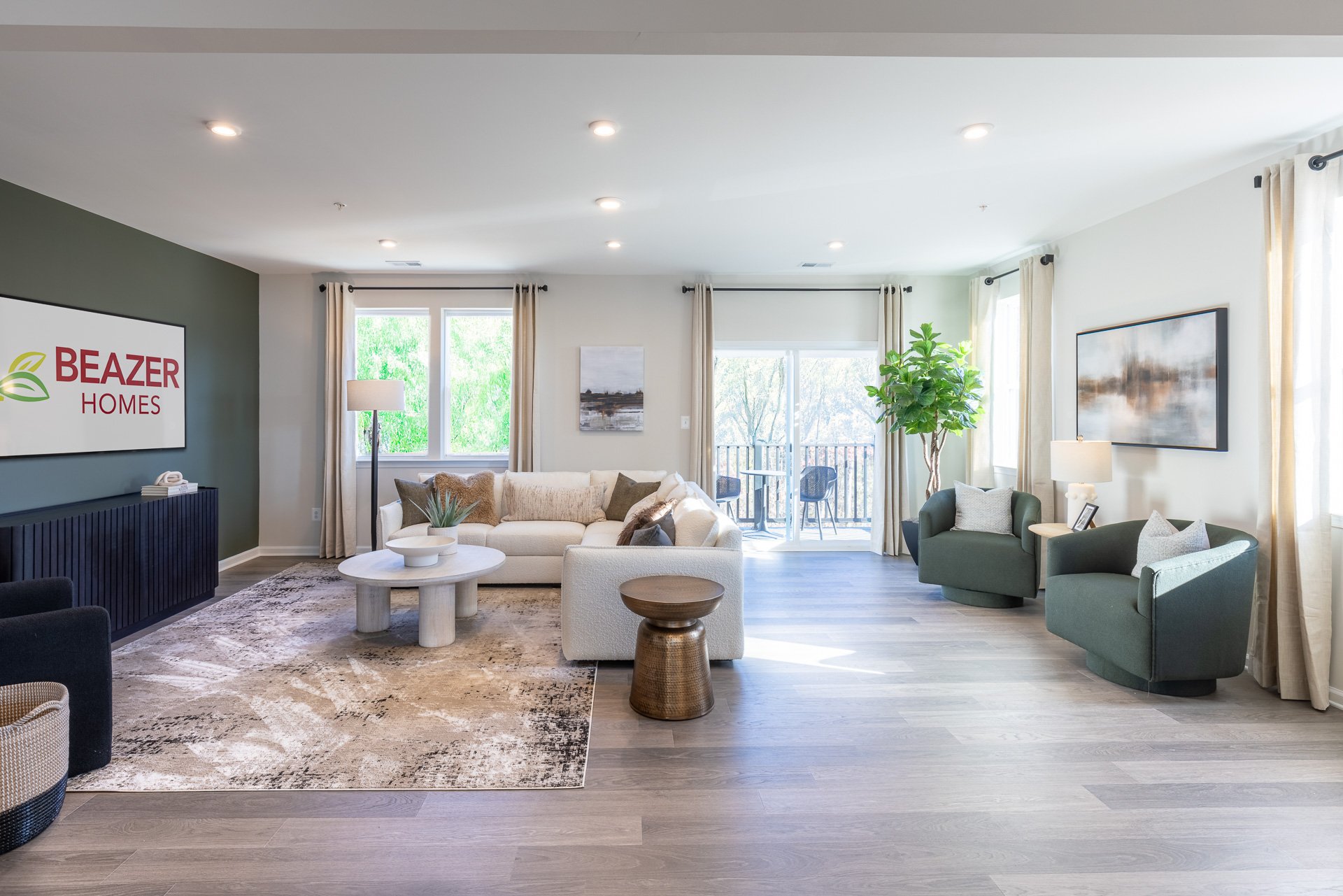 great room with couches and a coffee table