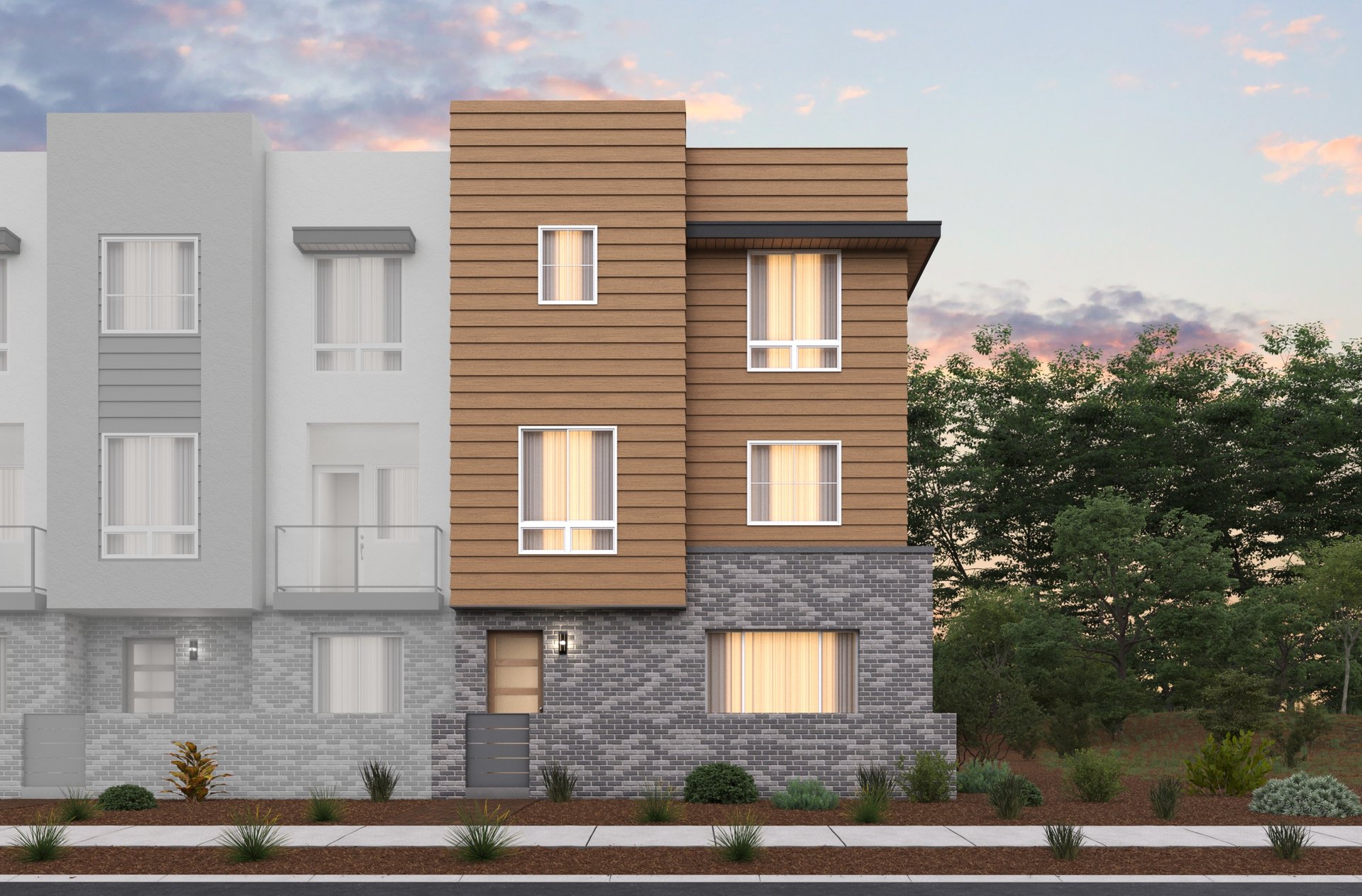 front exterior of 3-story brown and gray condo building