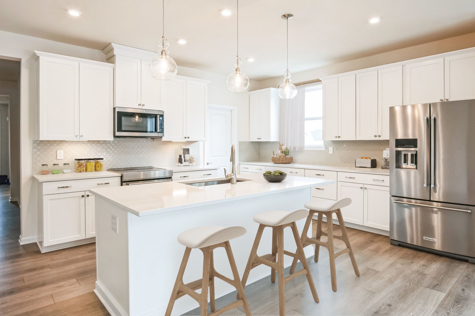 kitchen with a center island and barstools