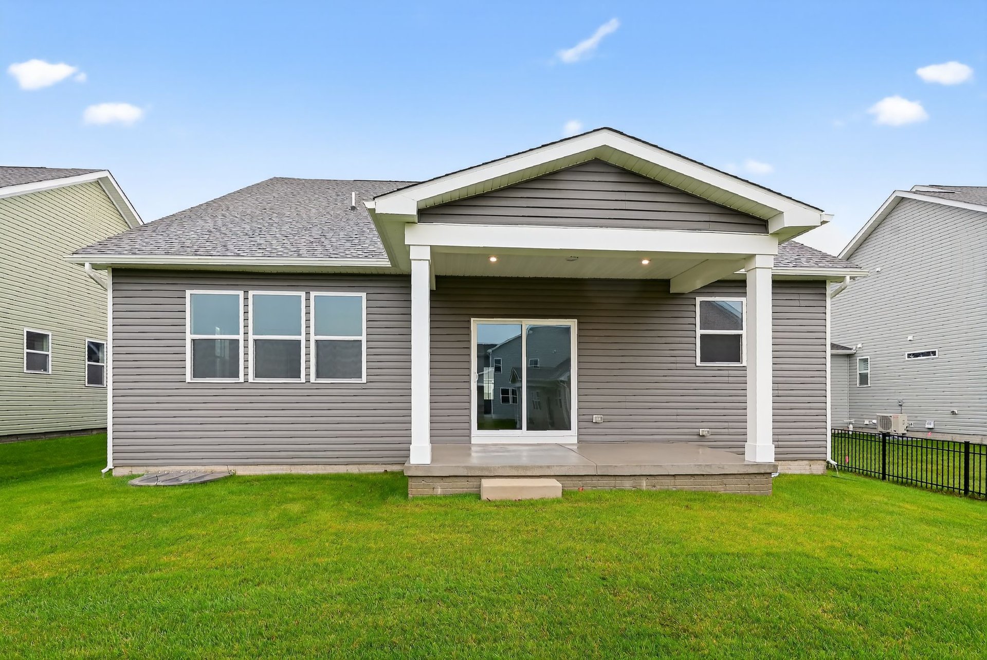 open back patio overlooking the backyard