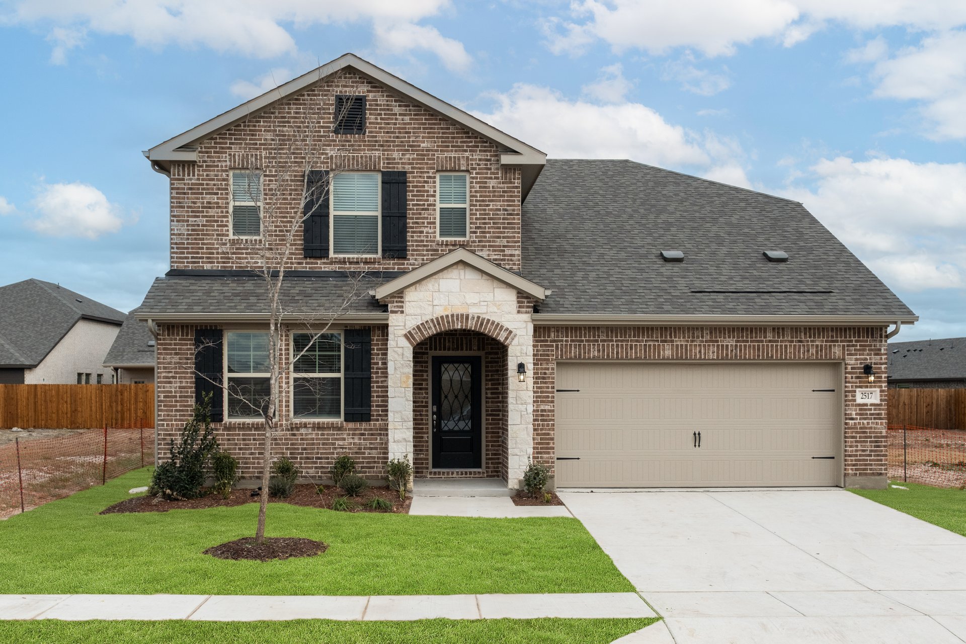 home exterior with brick and stone 