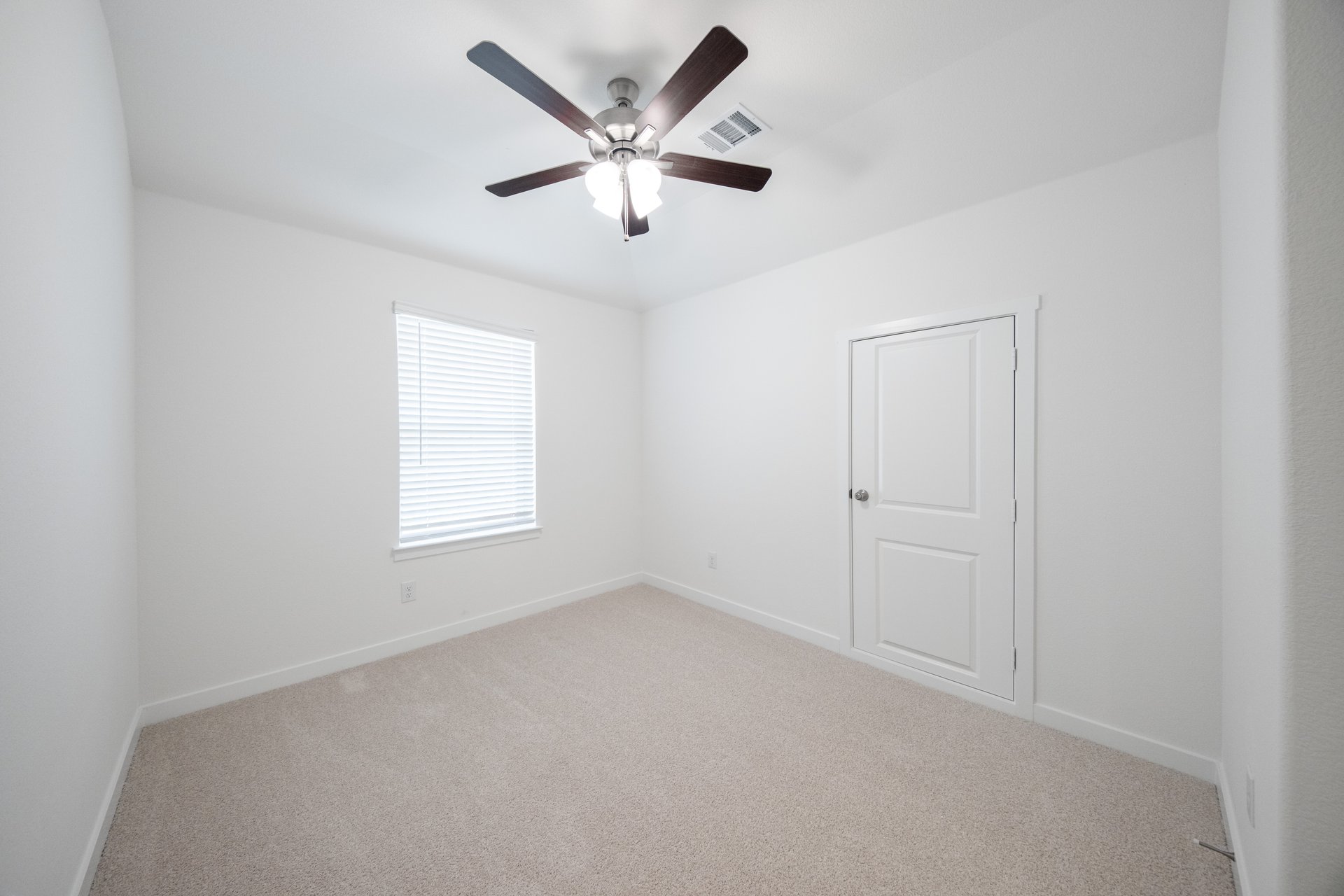 game room with carpet and ceiling fan