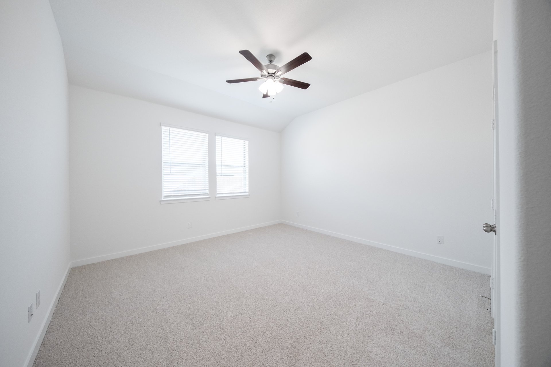 bedroom with carpet and ceiling fan