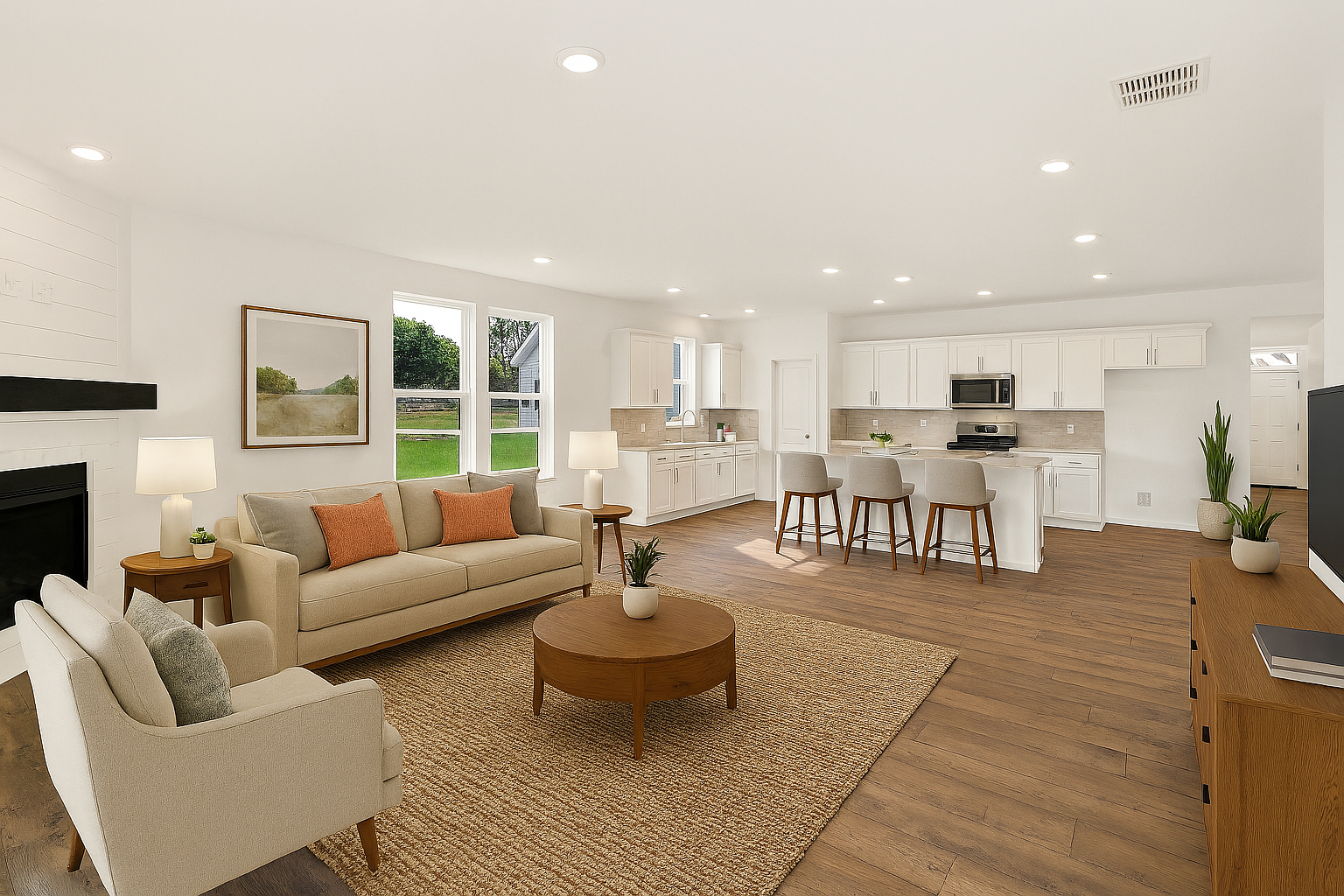 virtually staged great room that is open to the kitchen