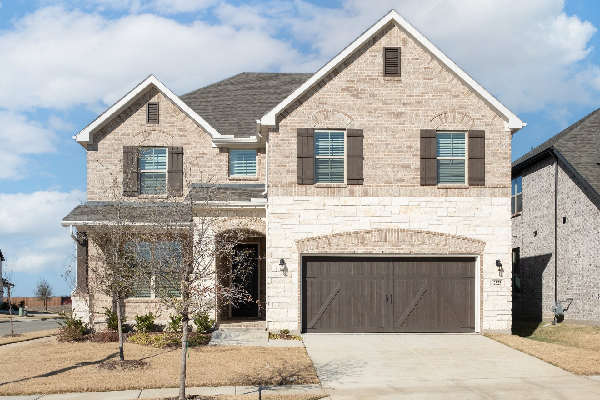 home exterior with brick and stone 