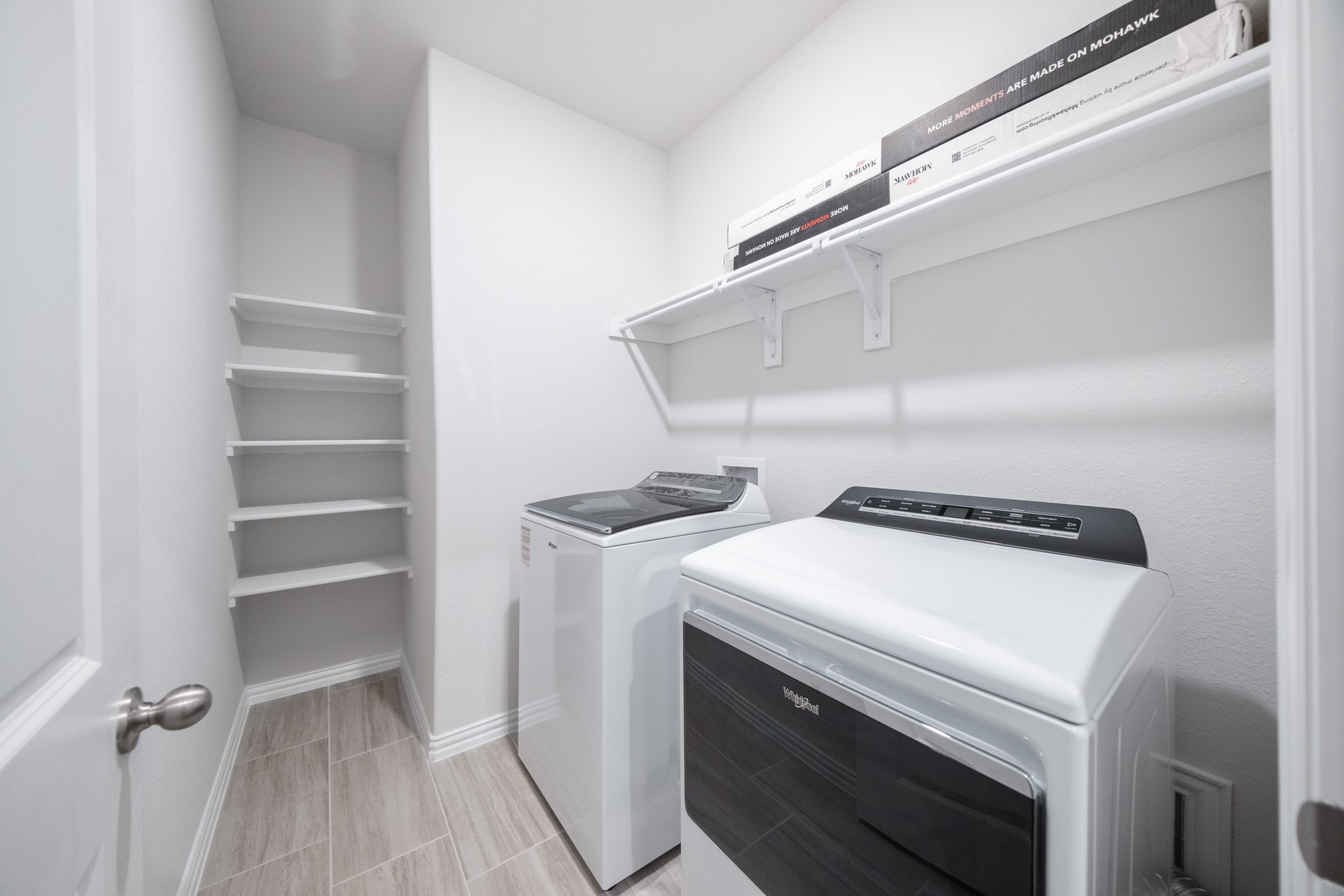 laundry room with included washer and dryer