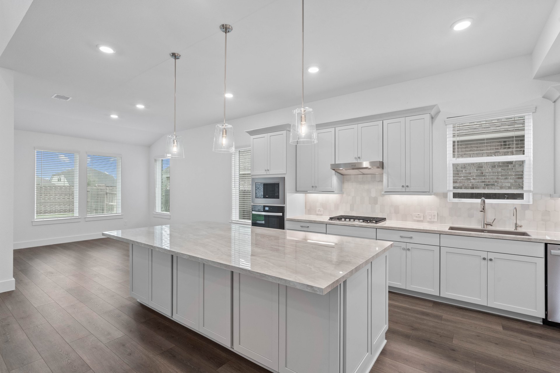 kitchen with white cabinets.