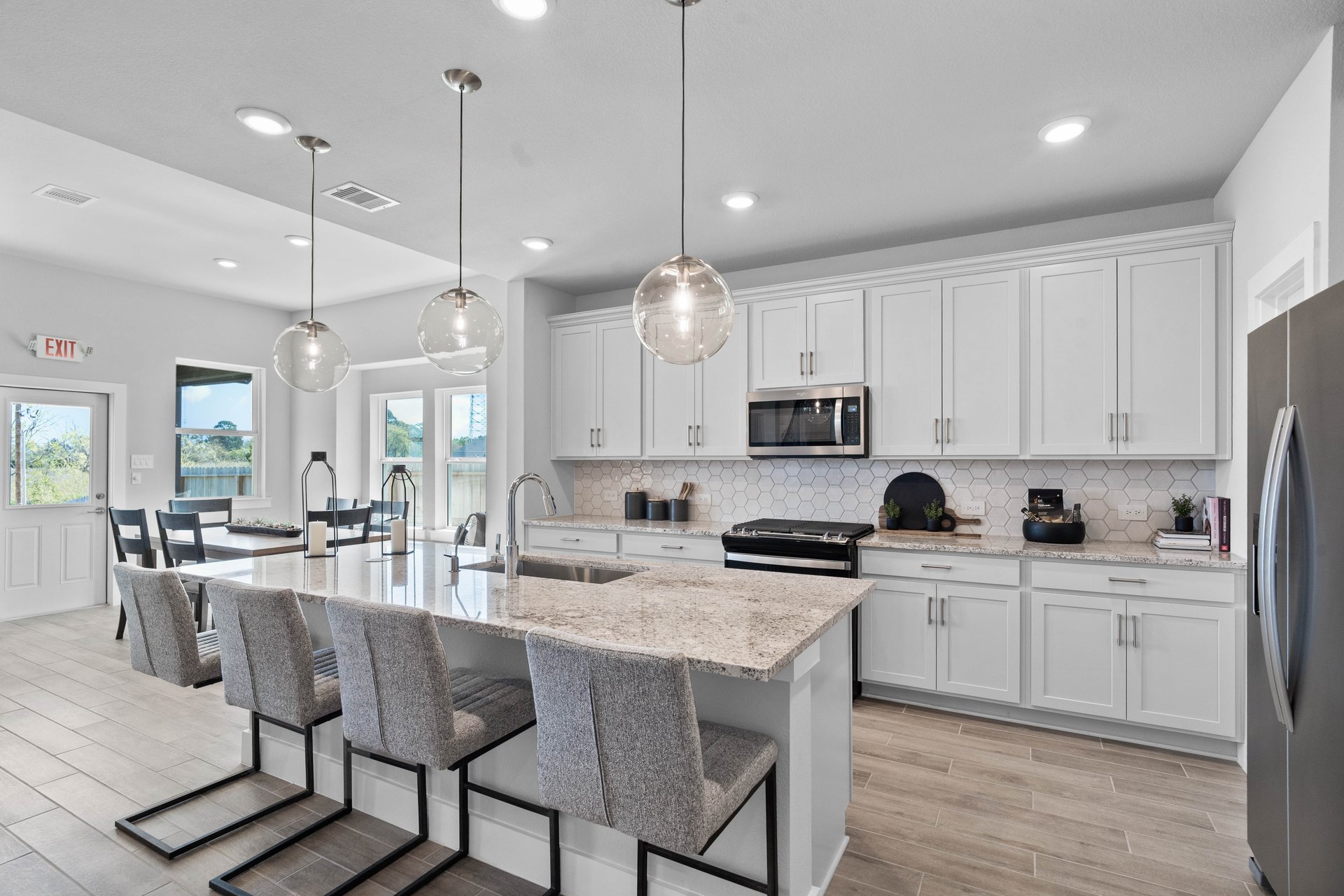 open kitchen with white cabinets