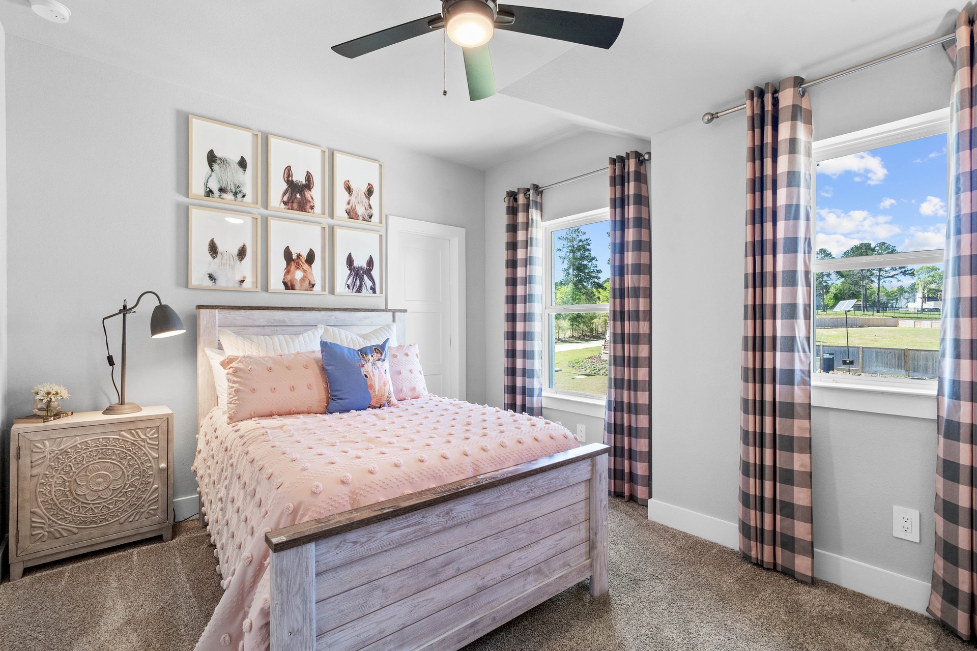 guest bedroom with windows