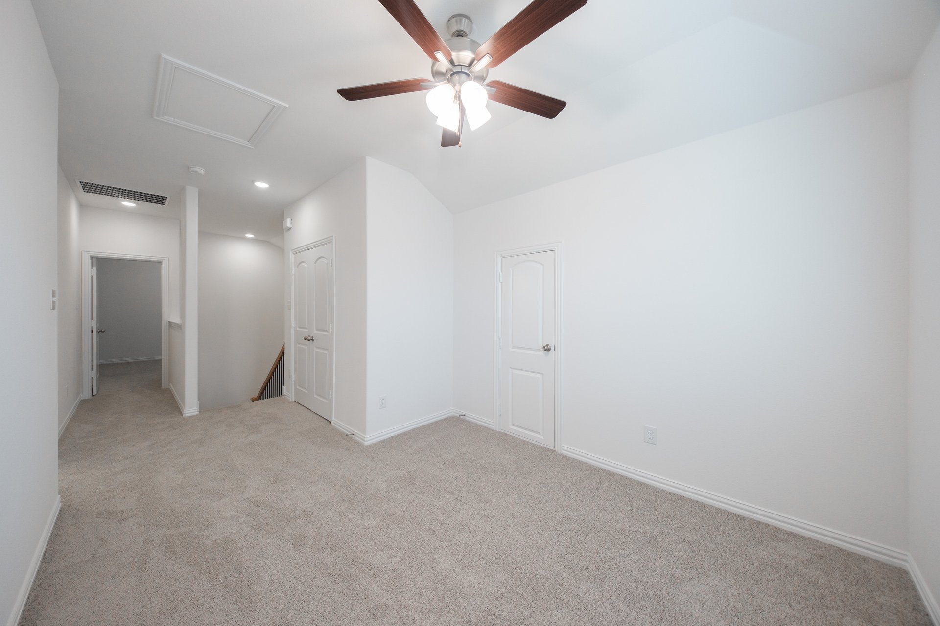 open gameroom with carpet and ceiling fan