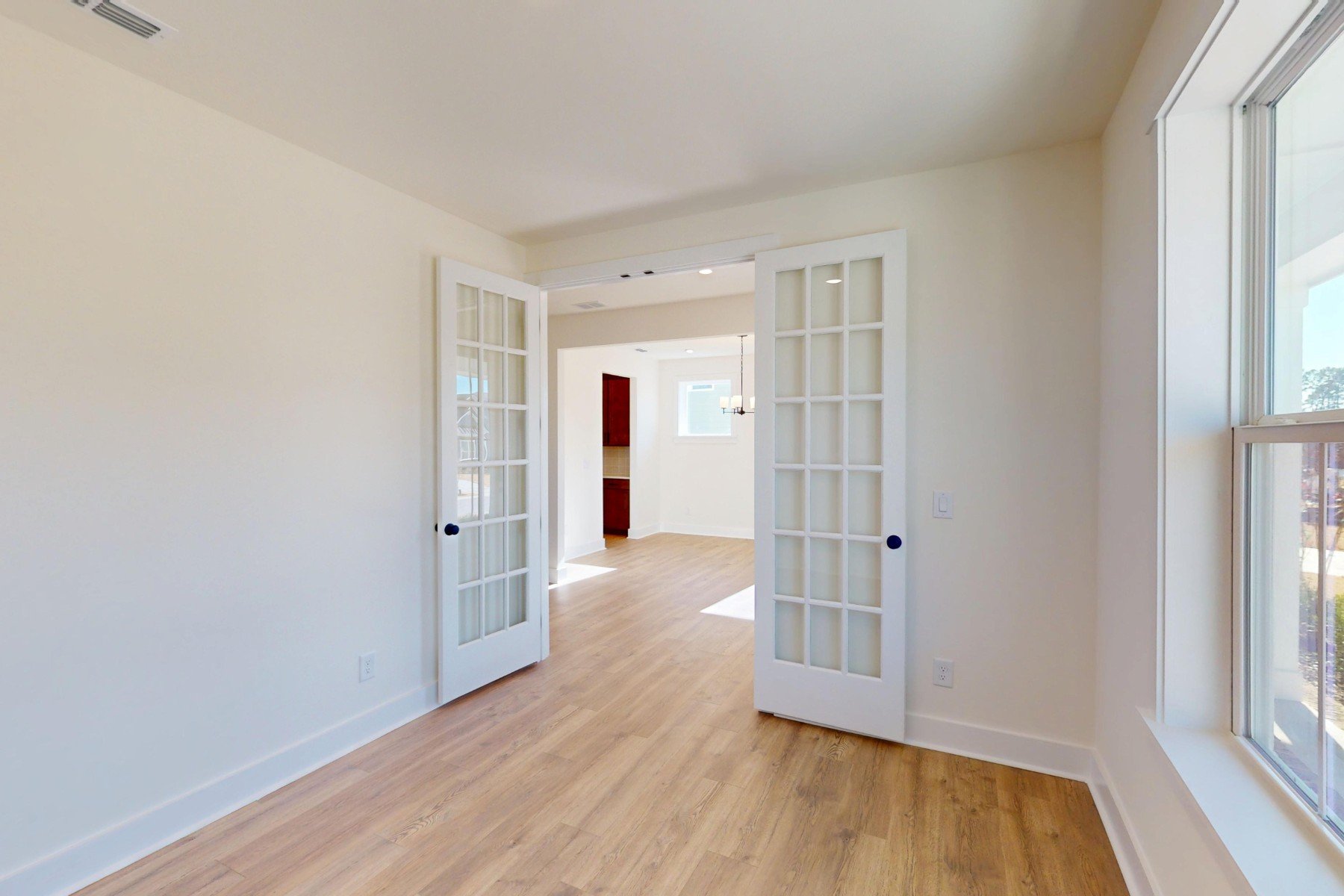 study with french doors and a window