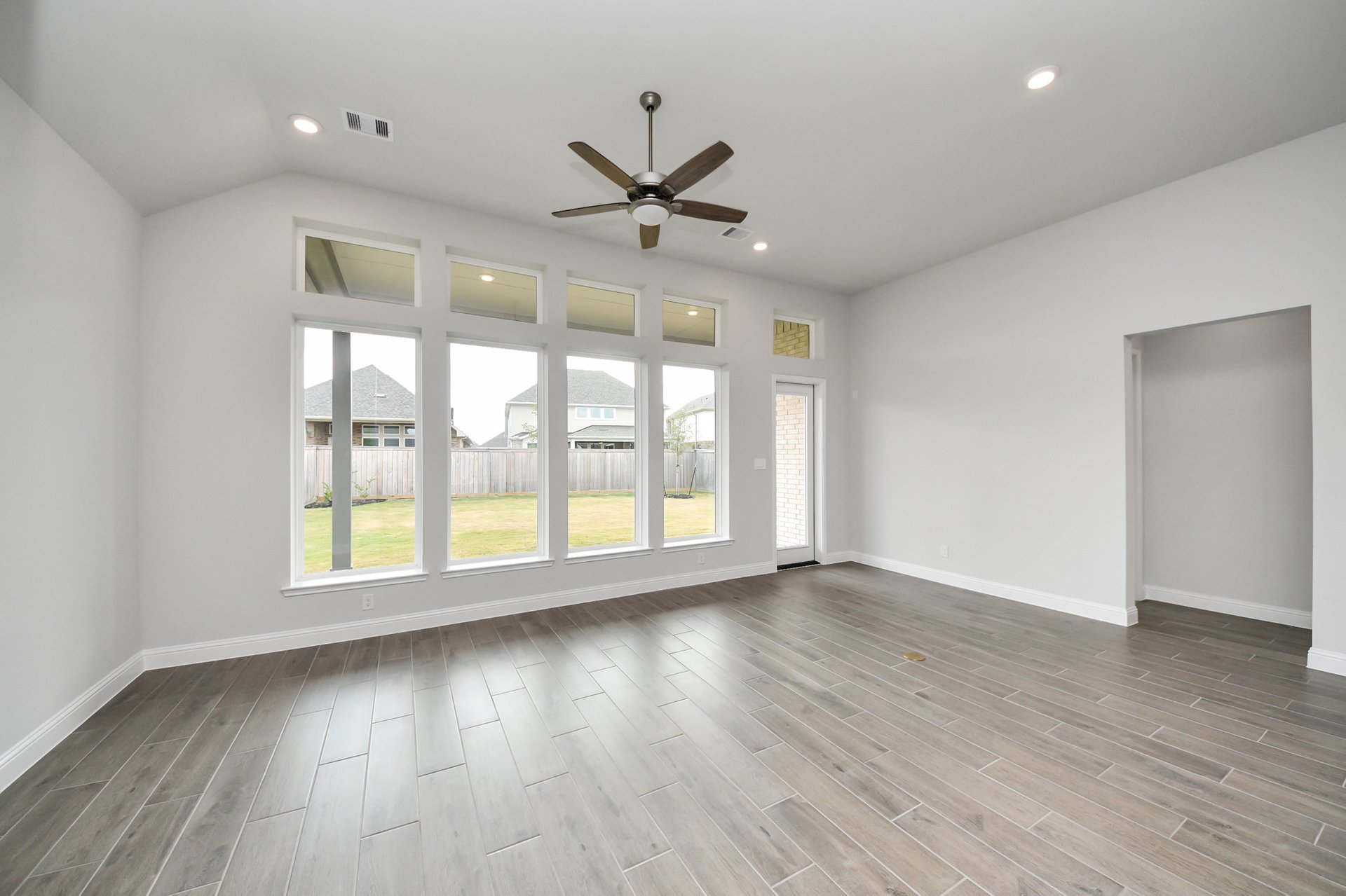 large family room with tall windows
