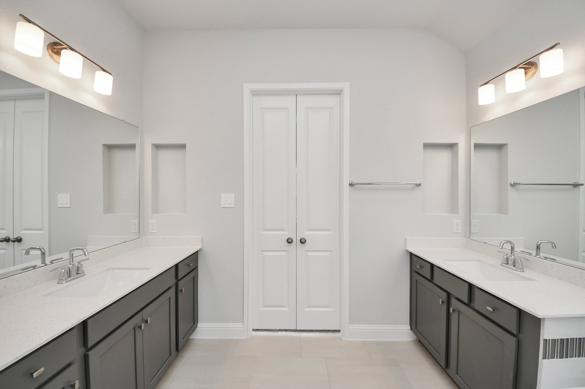 dual sinks and tile flooring