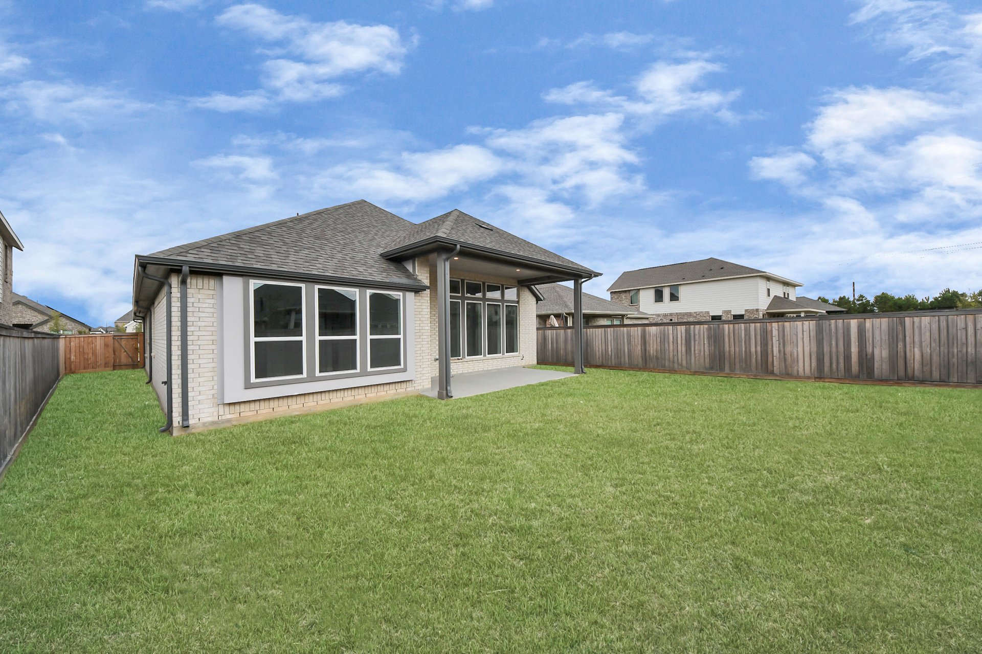 covered back porch and fully sodded yard