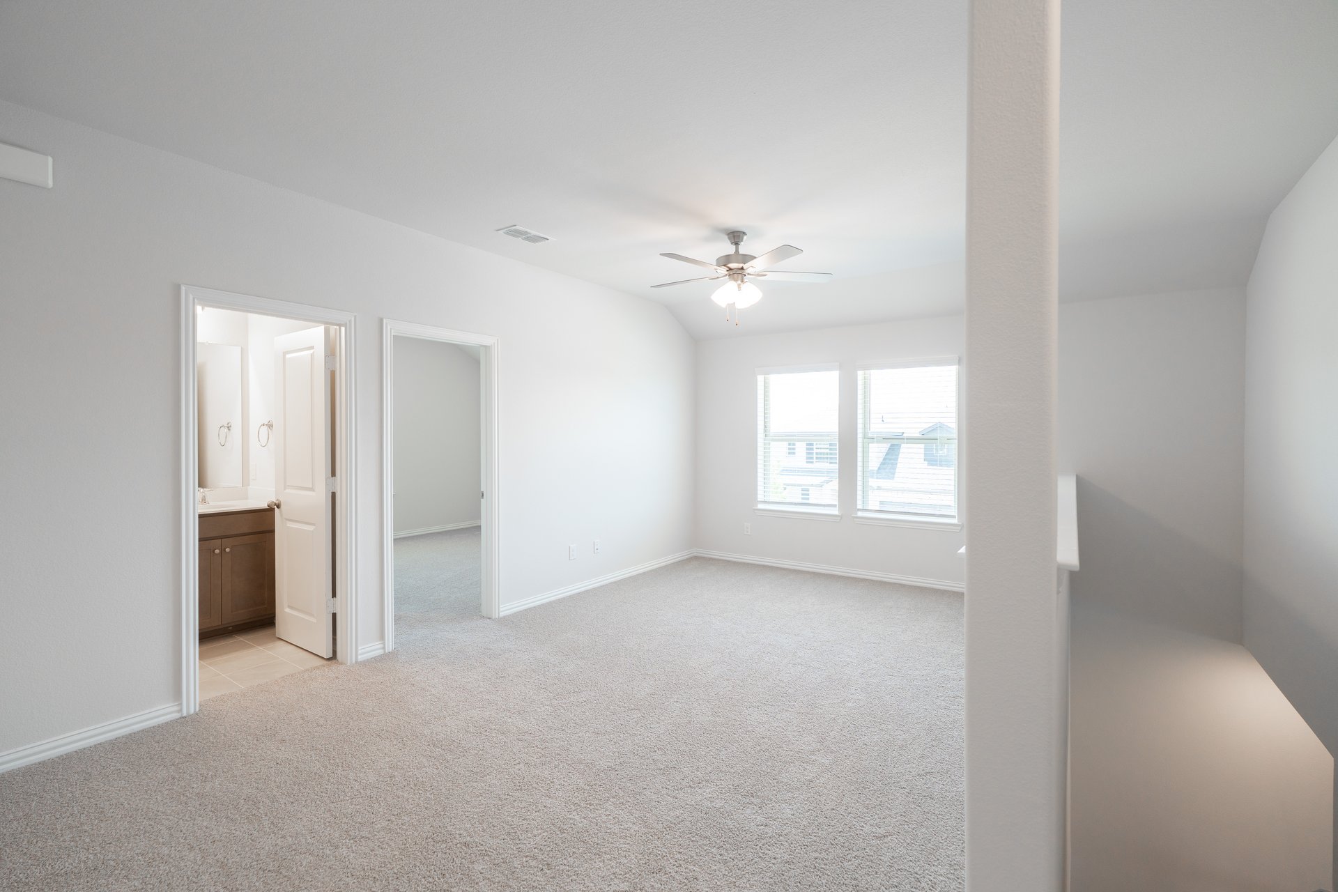 open gameroom with carpet and ceiling fan