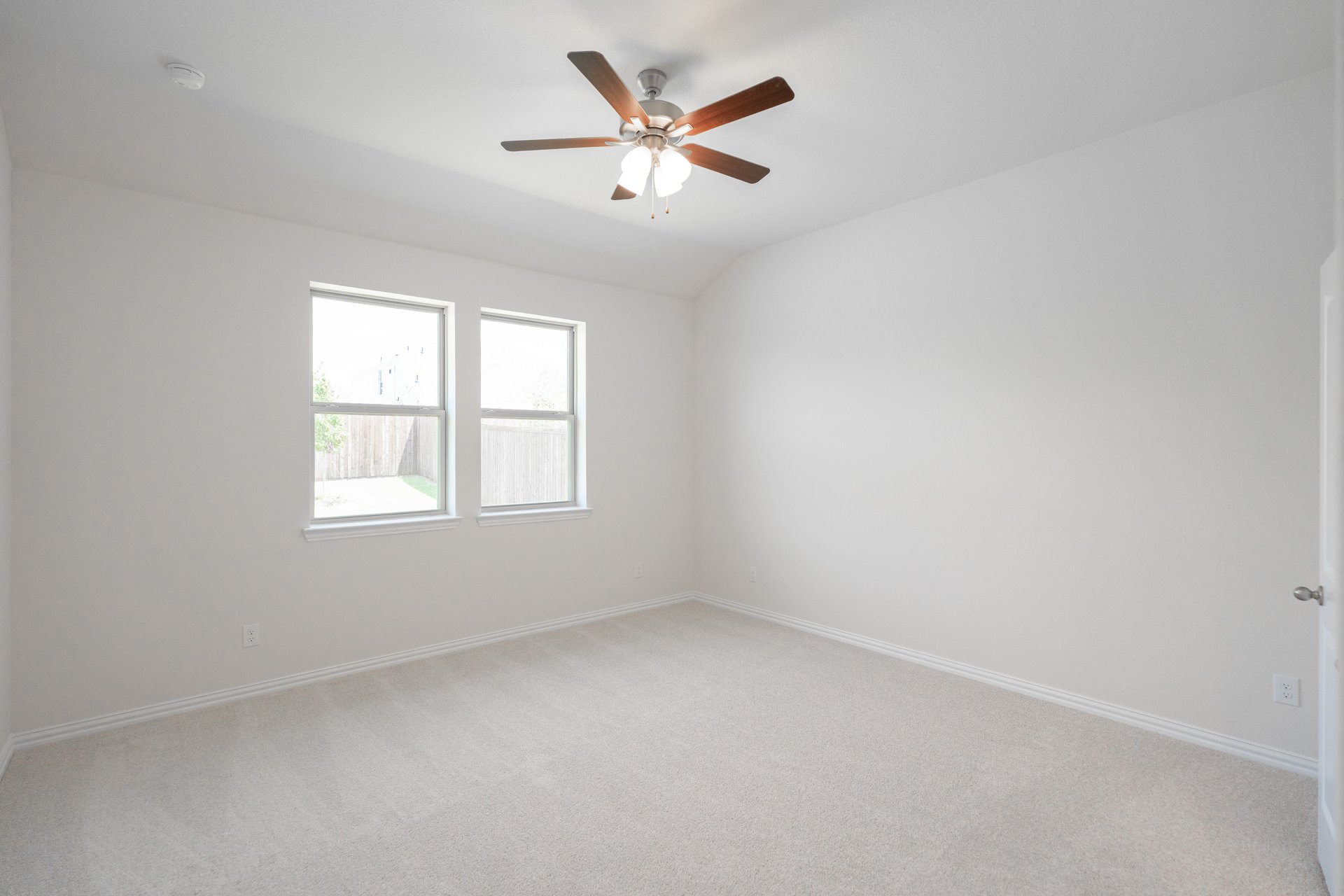 bedroom with carpet and ceiling fan