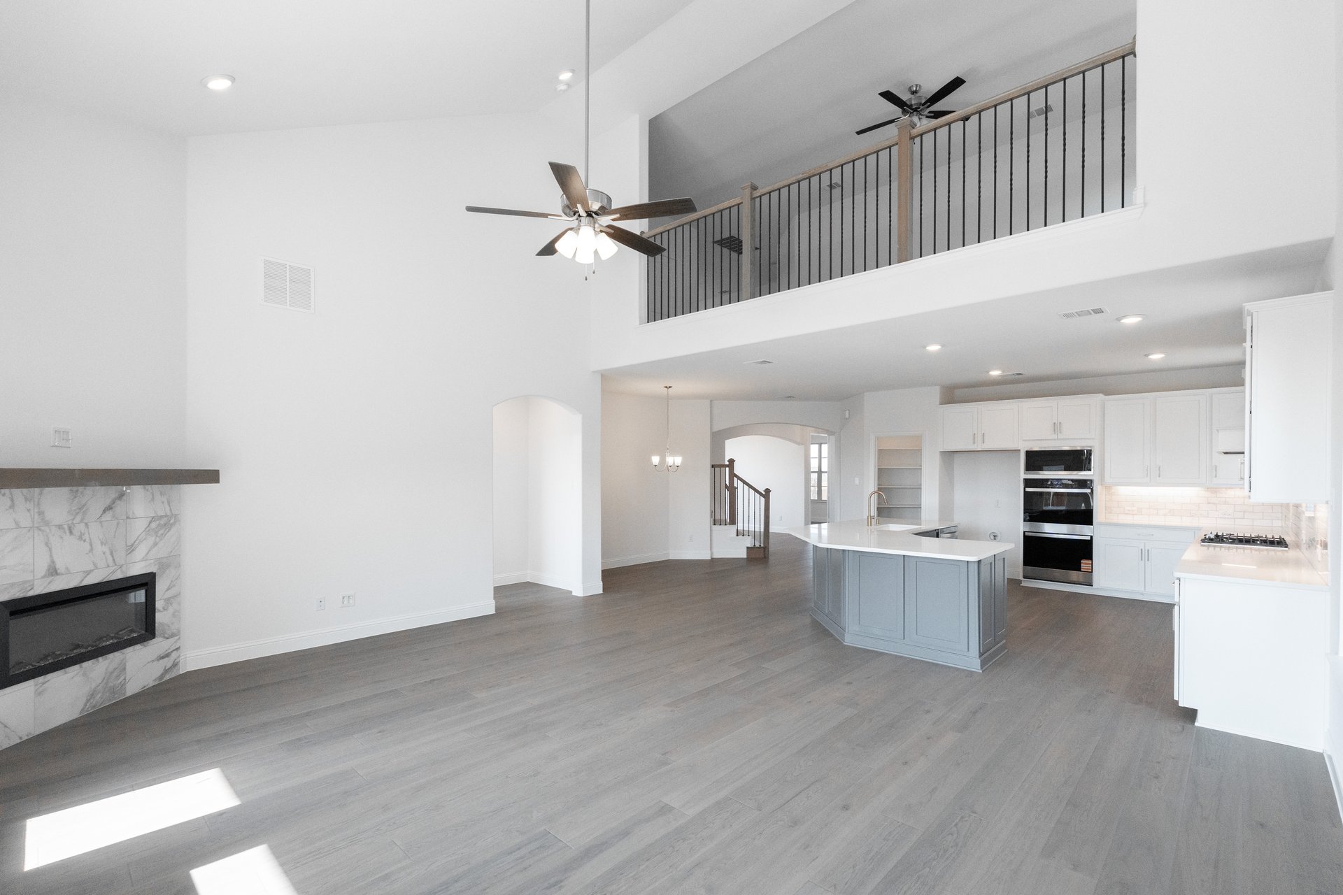open great room with two-story ceilings