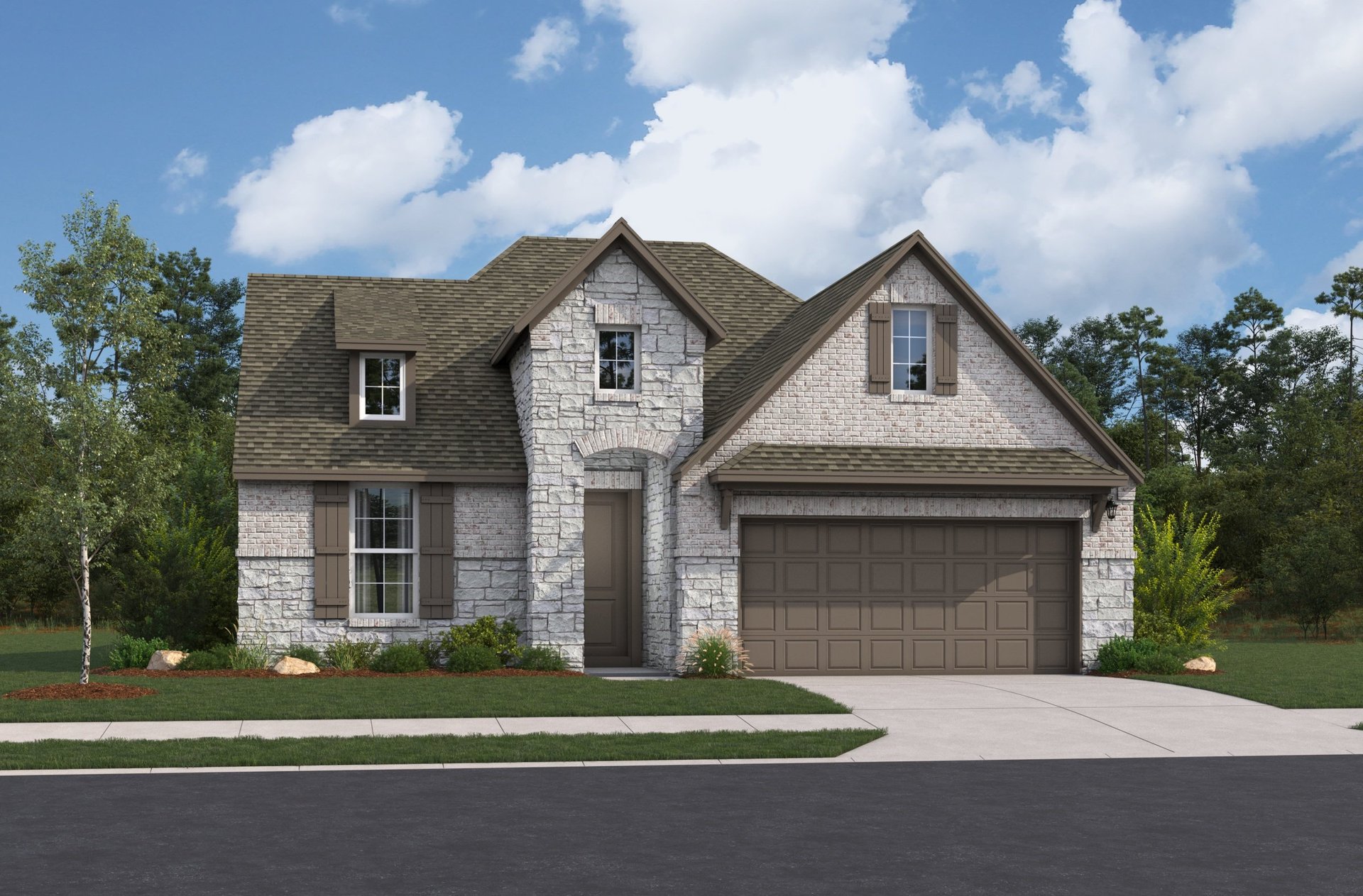 exterior with grass, trees & a 2-car garage