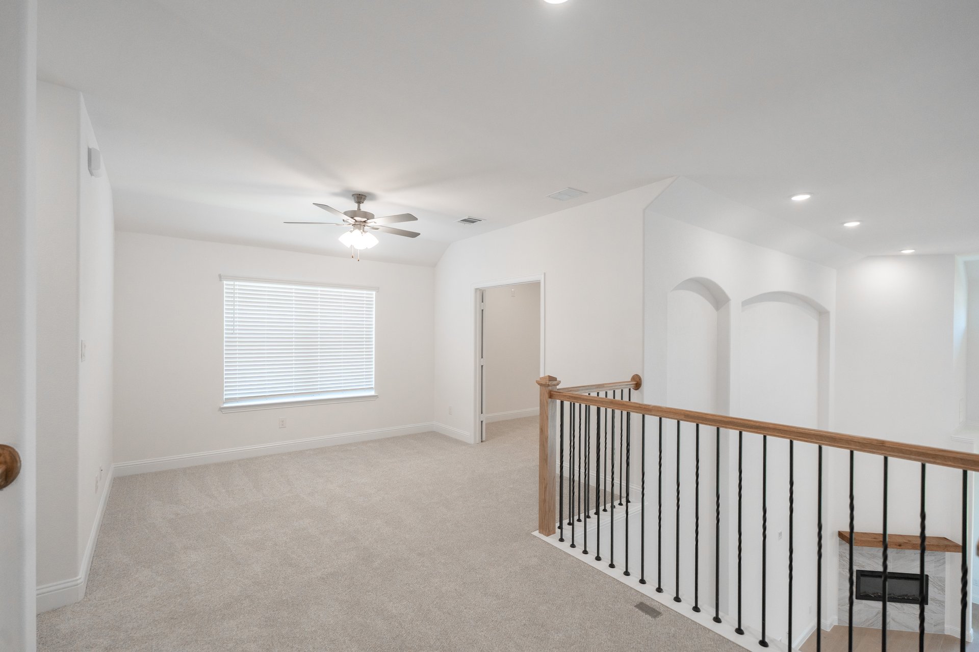 game room with carpet and ceiling fan