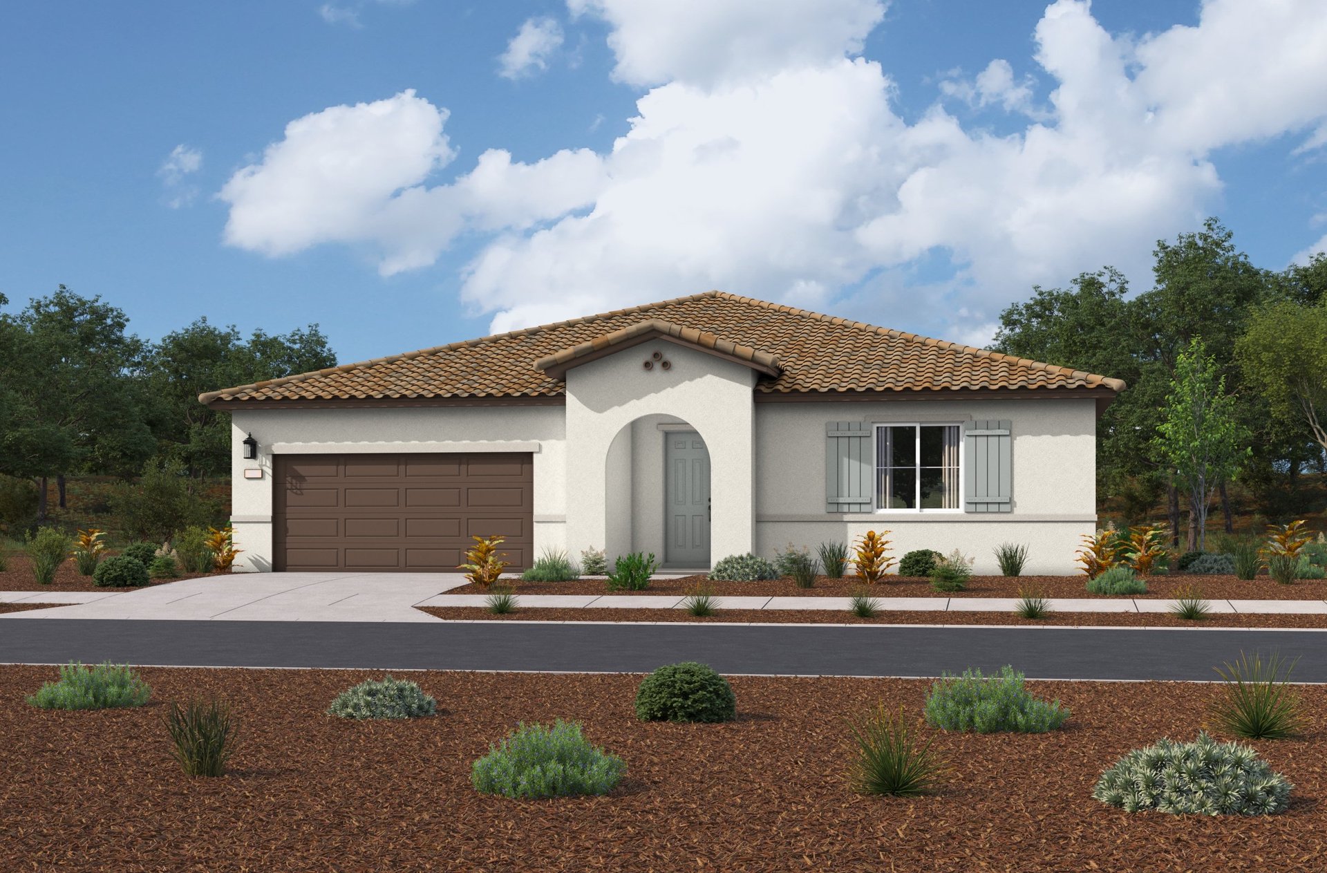 exterior of single-story home with neutral paint and desert landscaping