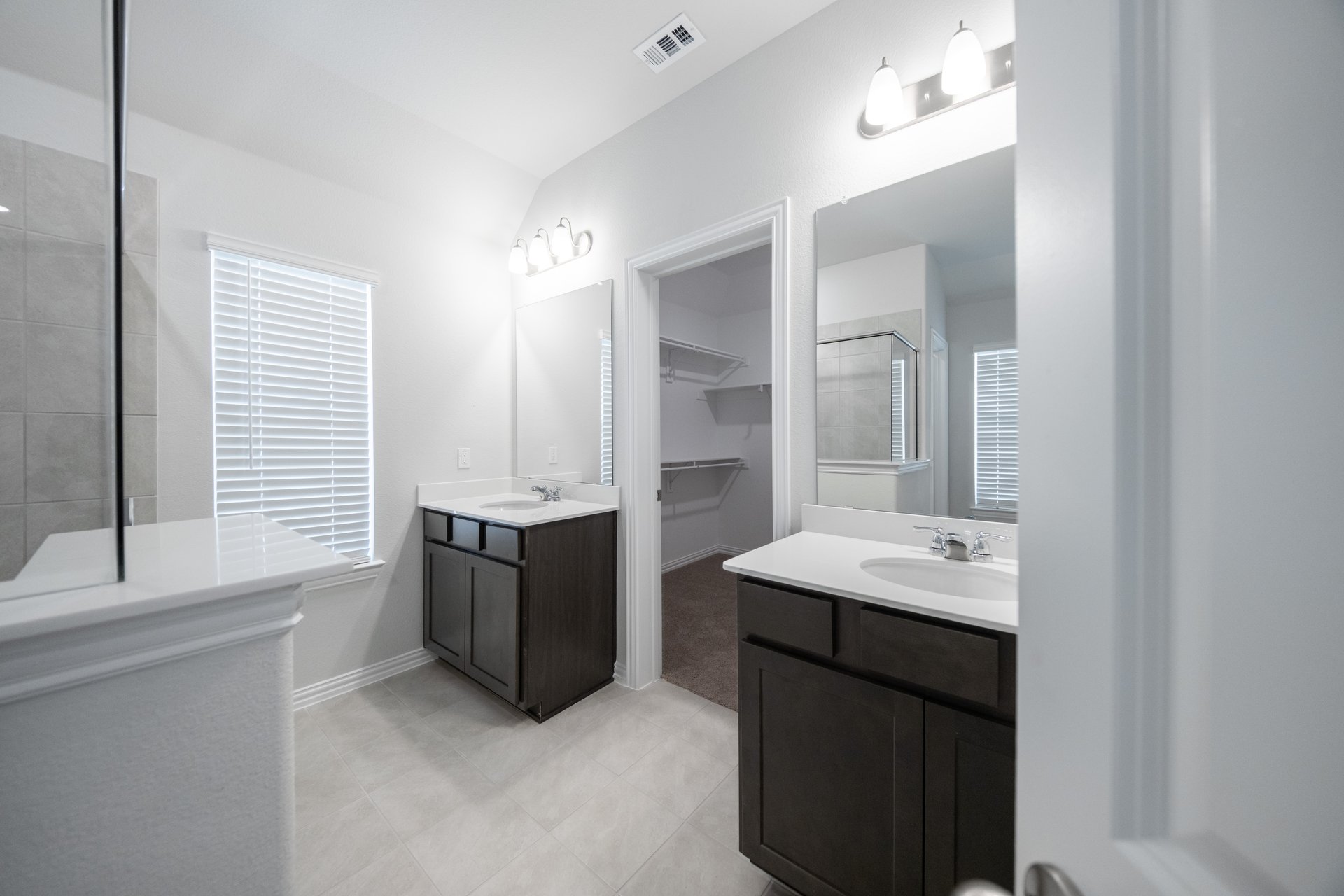 primary bathroom with separate sinks