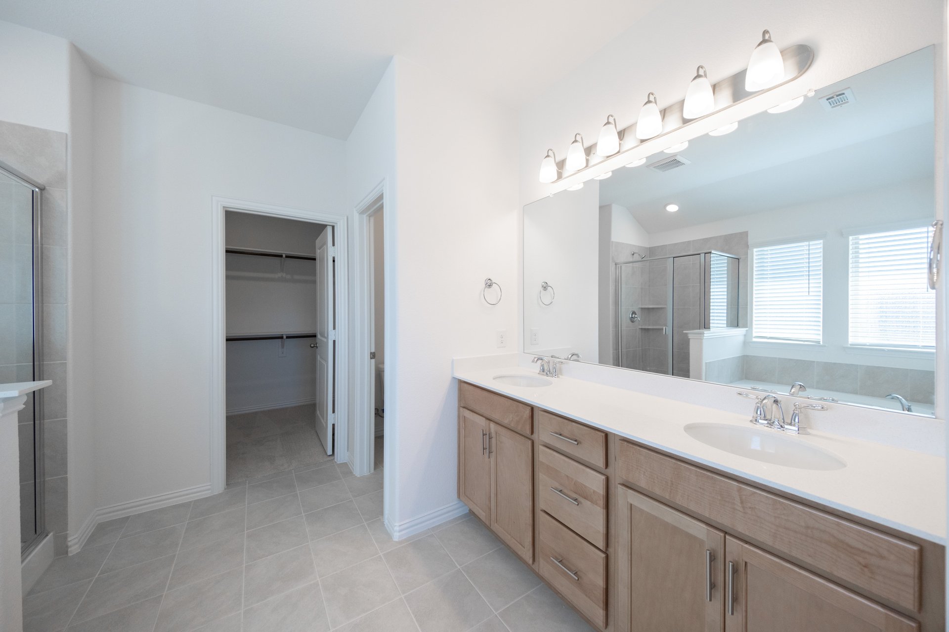 large primary bathroom with double sinks