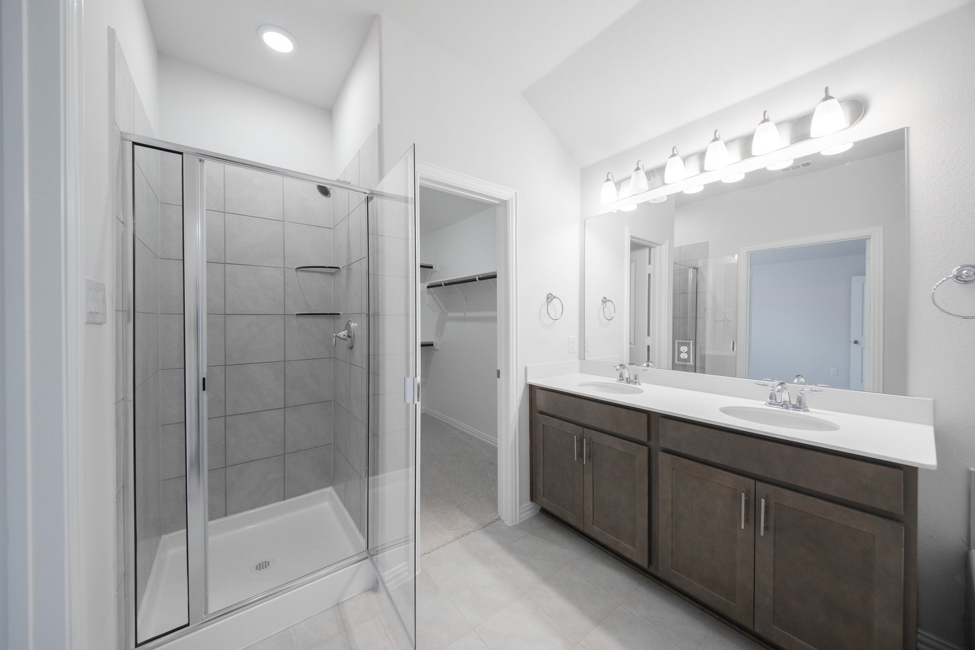 primary bathroom with soaking tub and walk-in shower