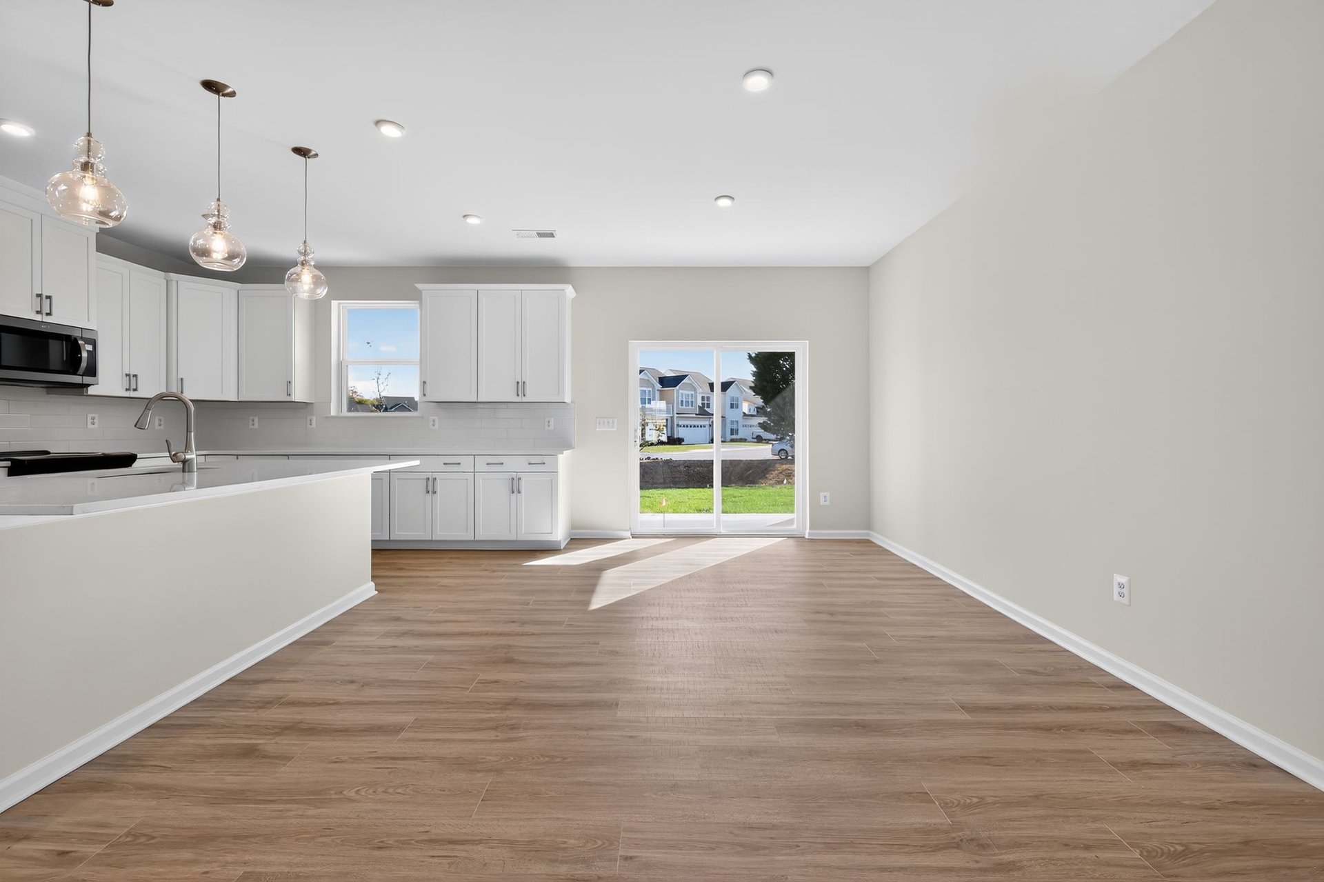 dining area with an abundance of natural light and designer floors