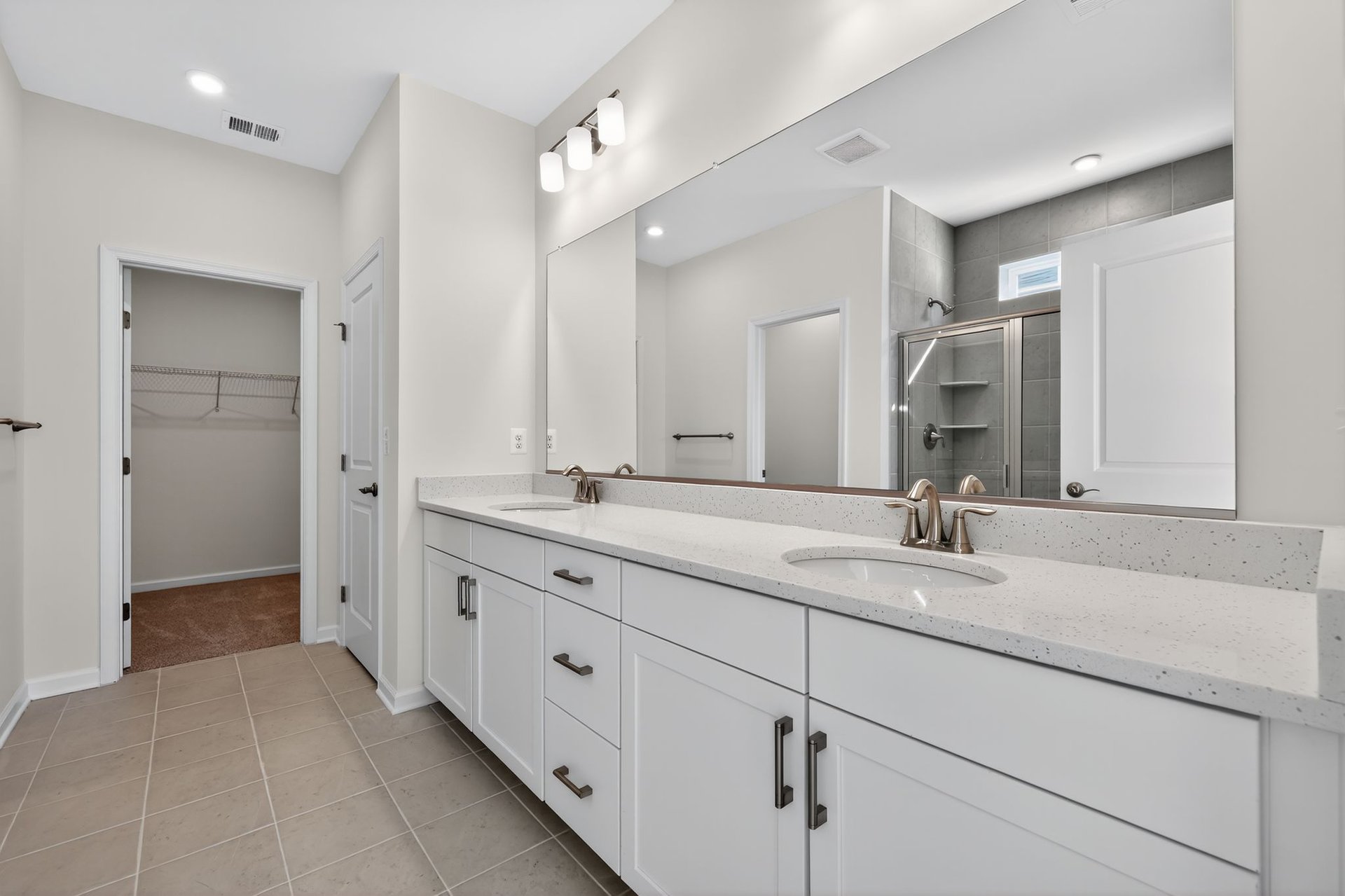 primary bath grants access to the walk-in closet