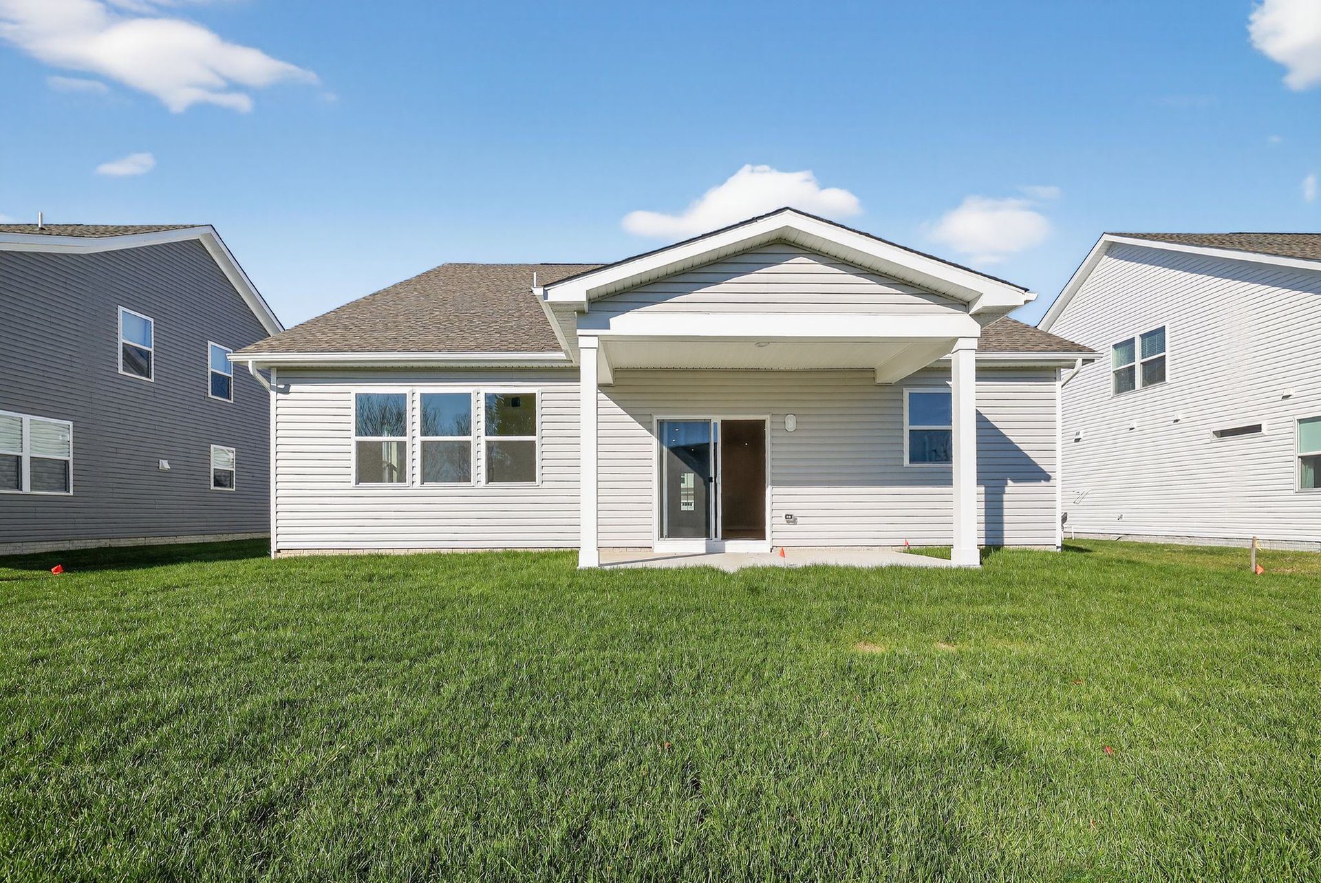 rear exterior with a covered patio