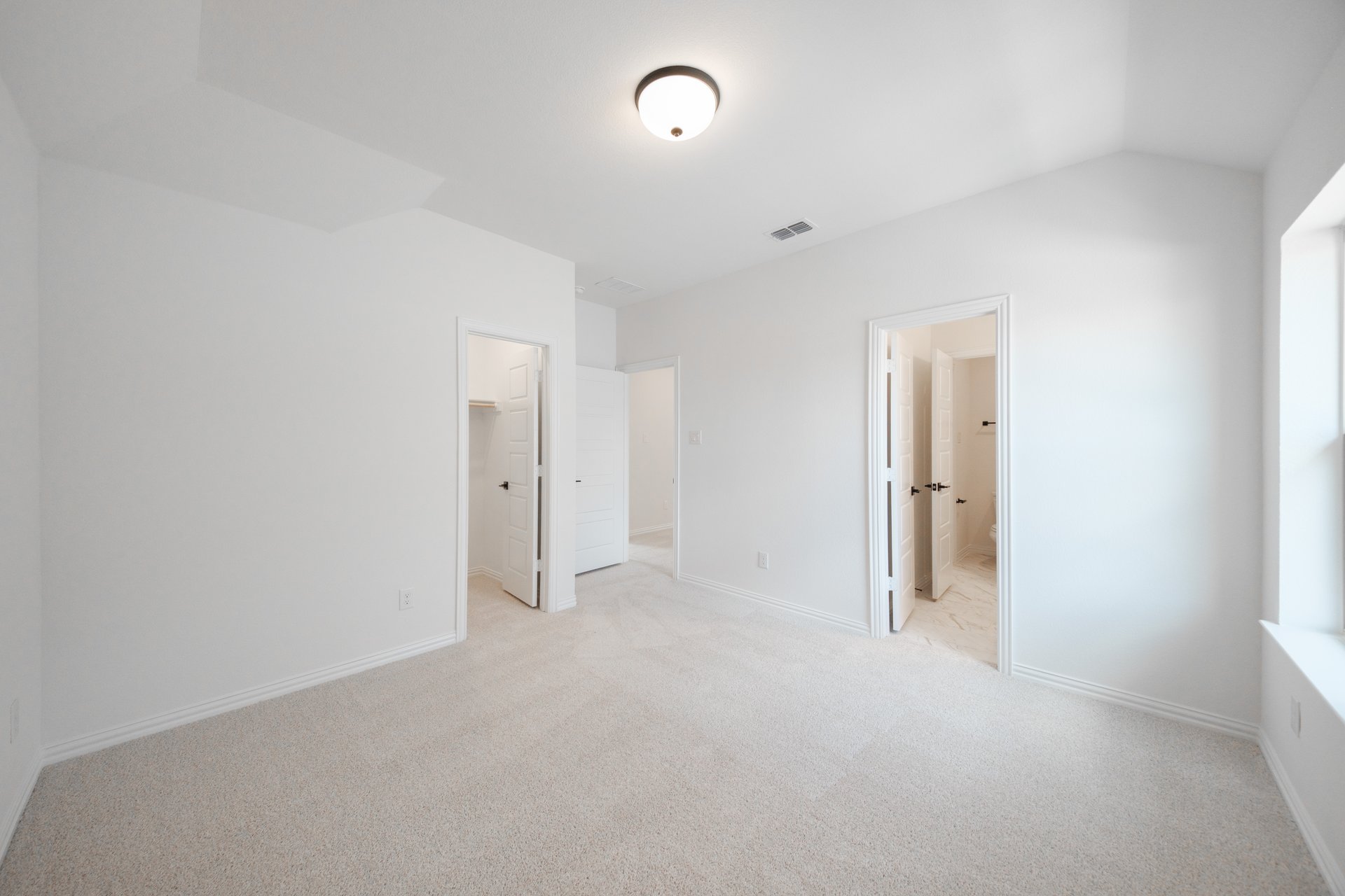 guest bedroom with carpet