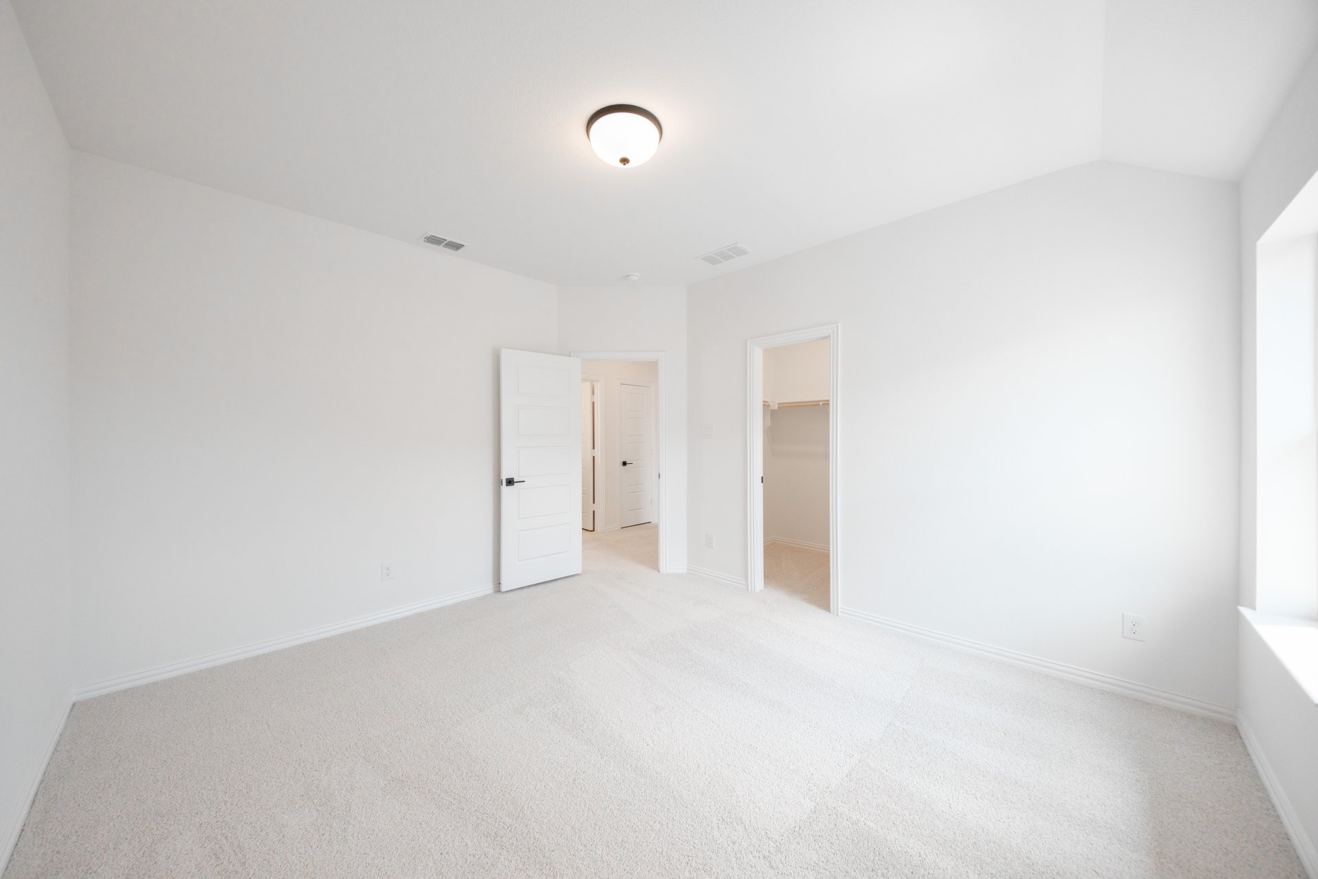 guest bedroom with carpet
