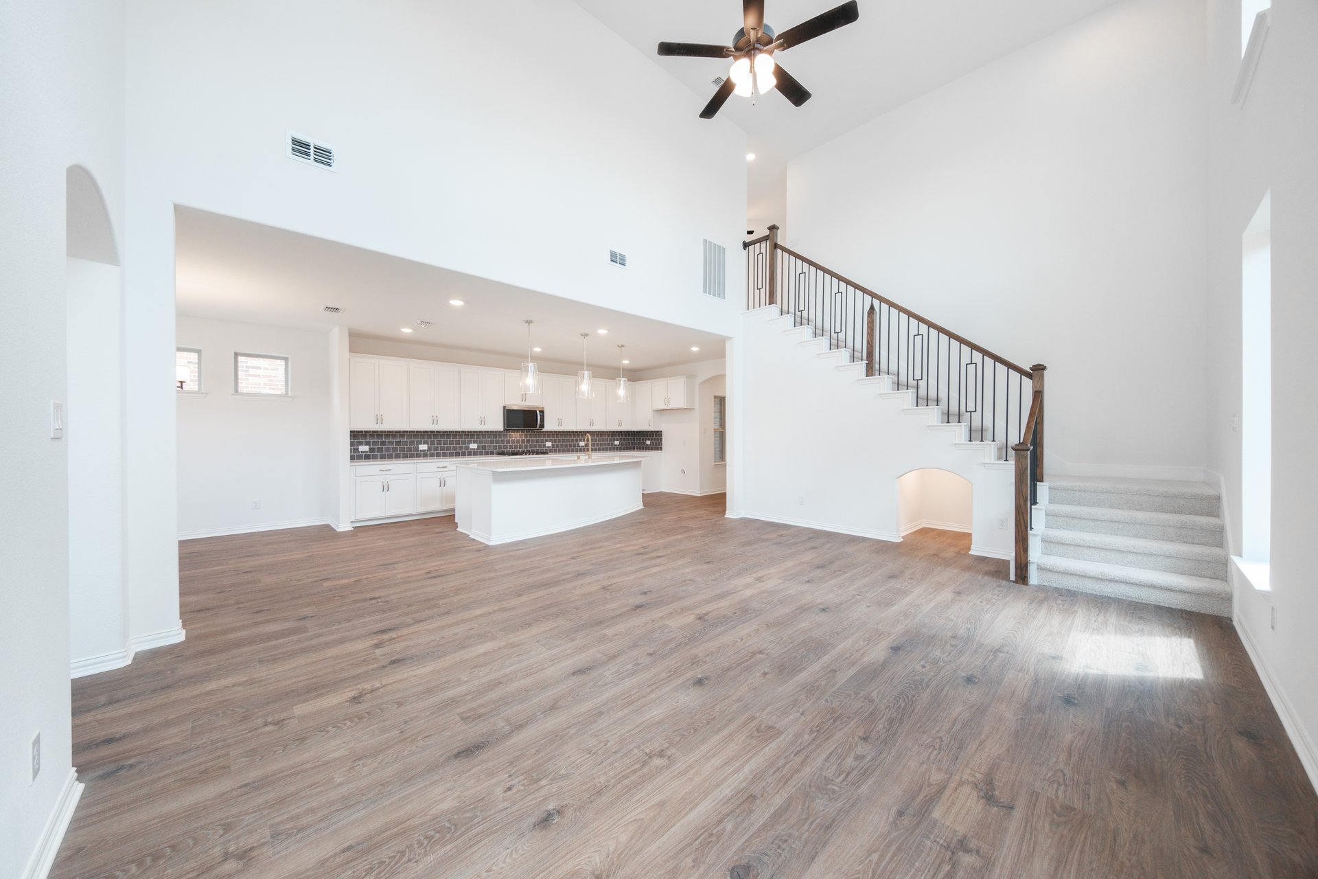 open great room with hardwood flooring