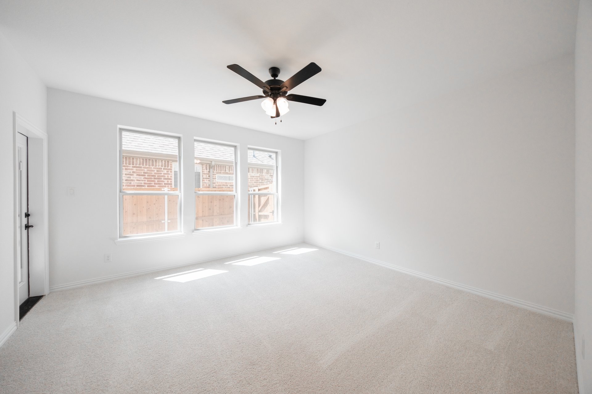 primary bedroom with carpet