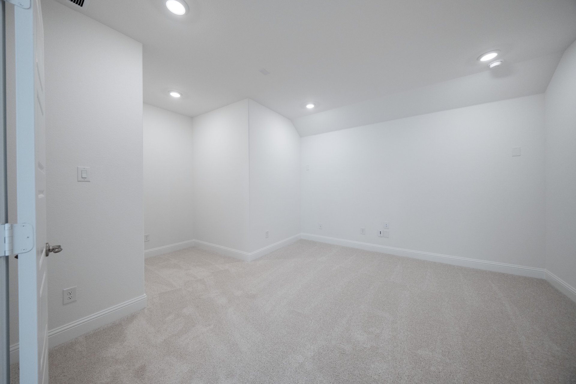 large media room with carpet and recessed lighting