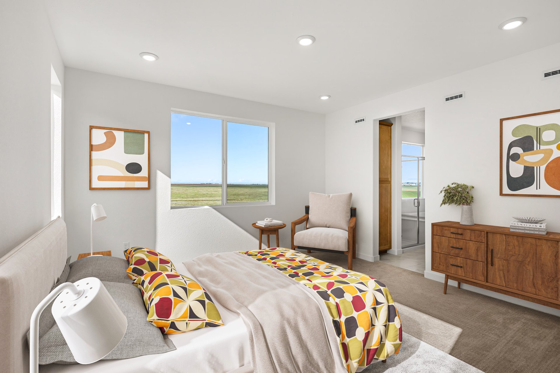 bedroom with tan carpet, wood dresser, colorful abstract wall art & bedding, window, and wood chair in corner