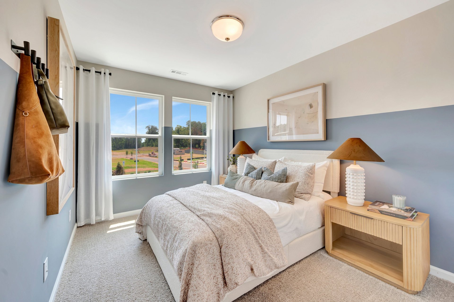 secondary bedroom with two windows
