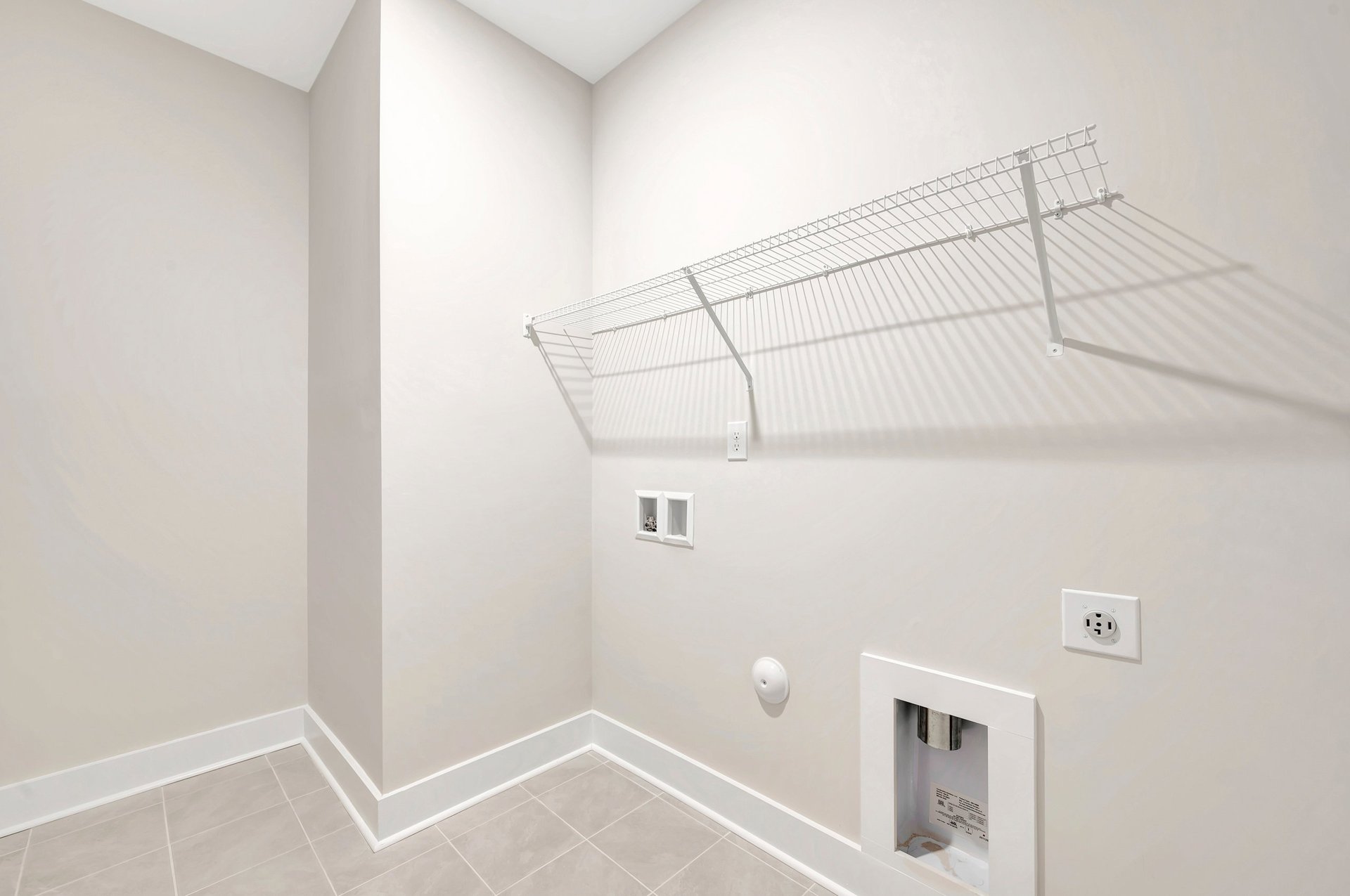 laundry room with a wire shelf