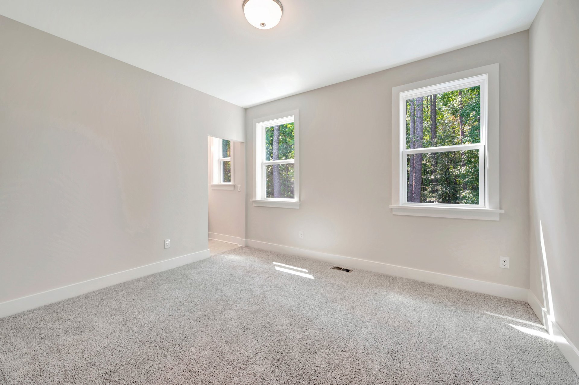 secondary bedroom with carpet